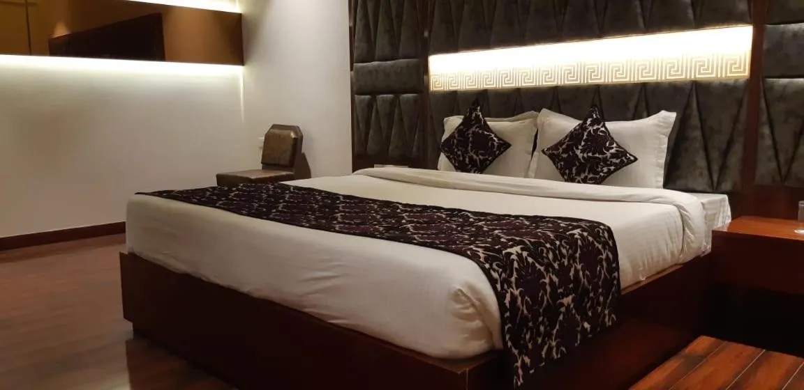 Bed in Grand Geet Hotels