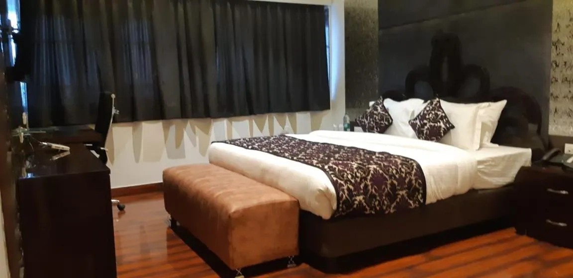 Bed in Grand Geet Hotels