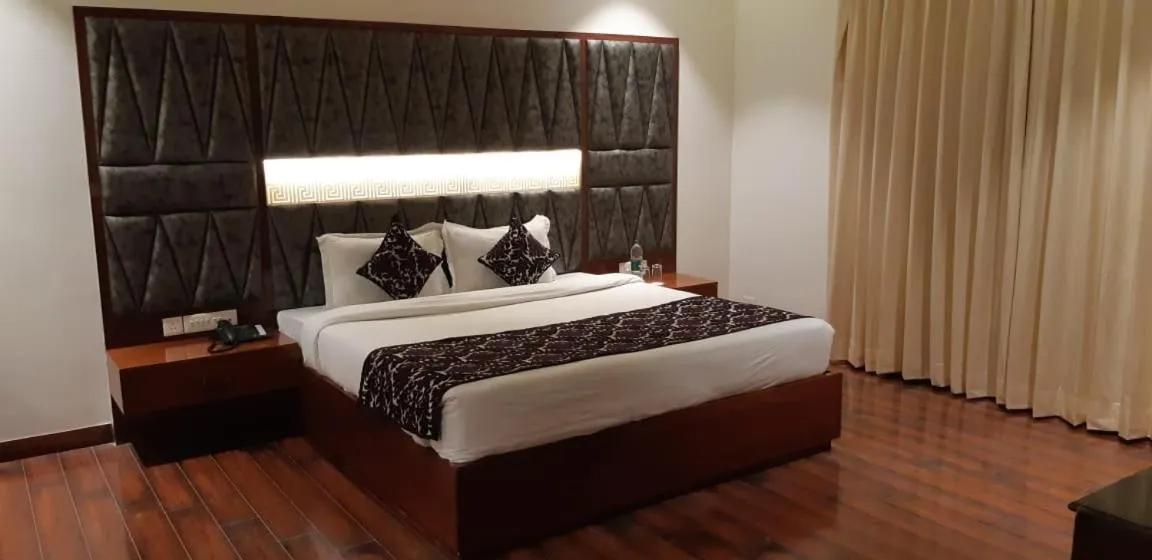 Bed in Grand Geet Hotels