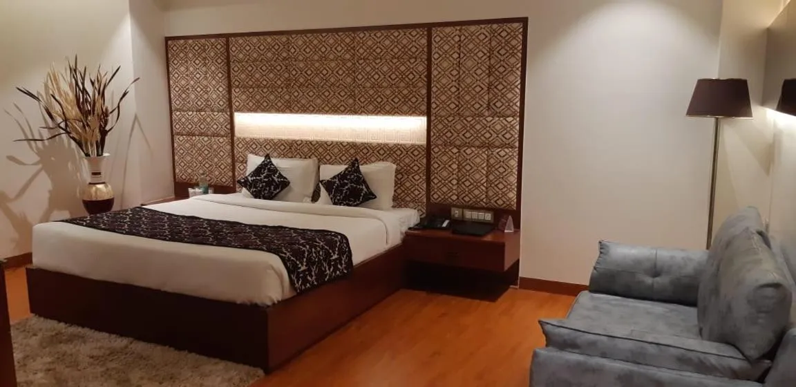 Bed in Grand Geet Hotels