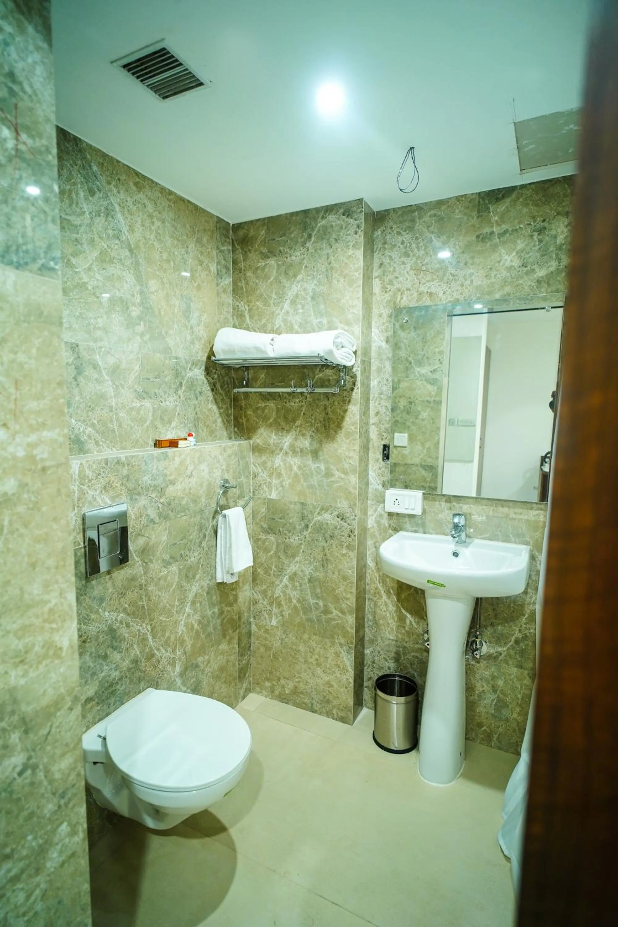 Toilet in Welkin Hotel