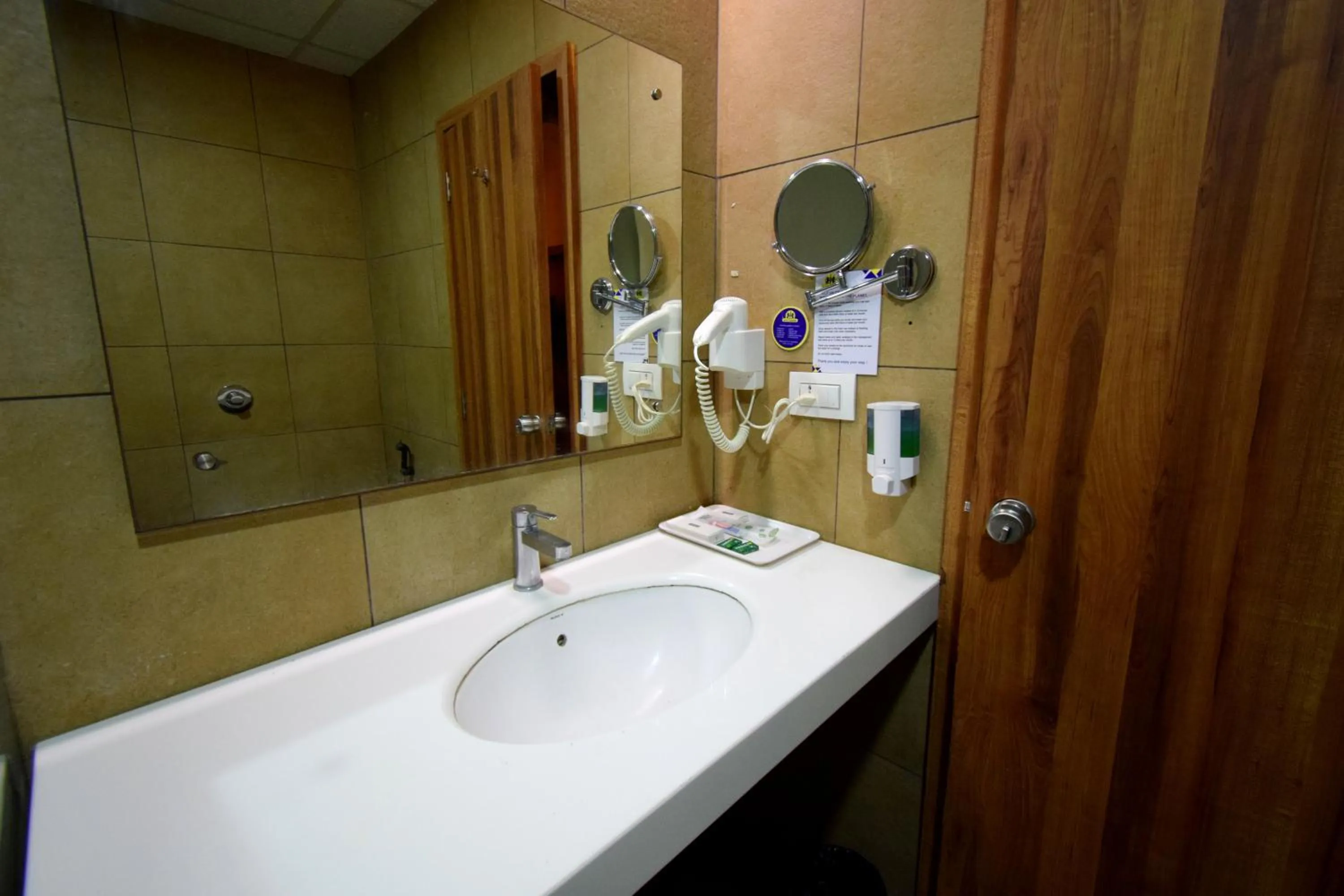 Bathroom in Bapu's Resort, Dwarka