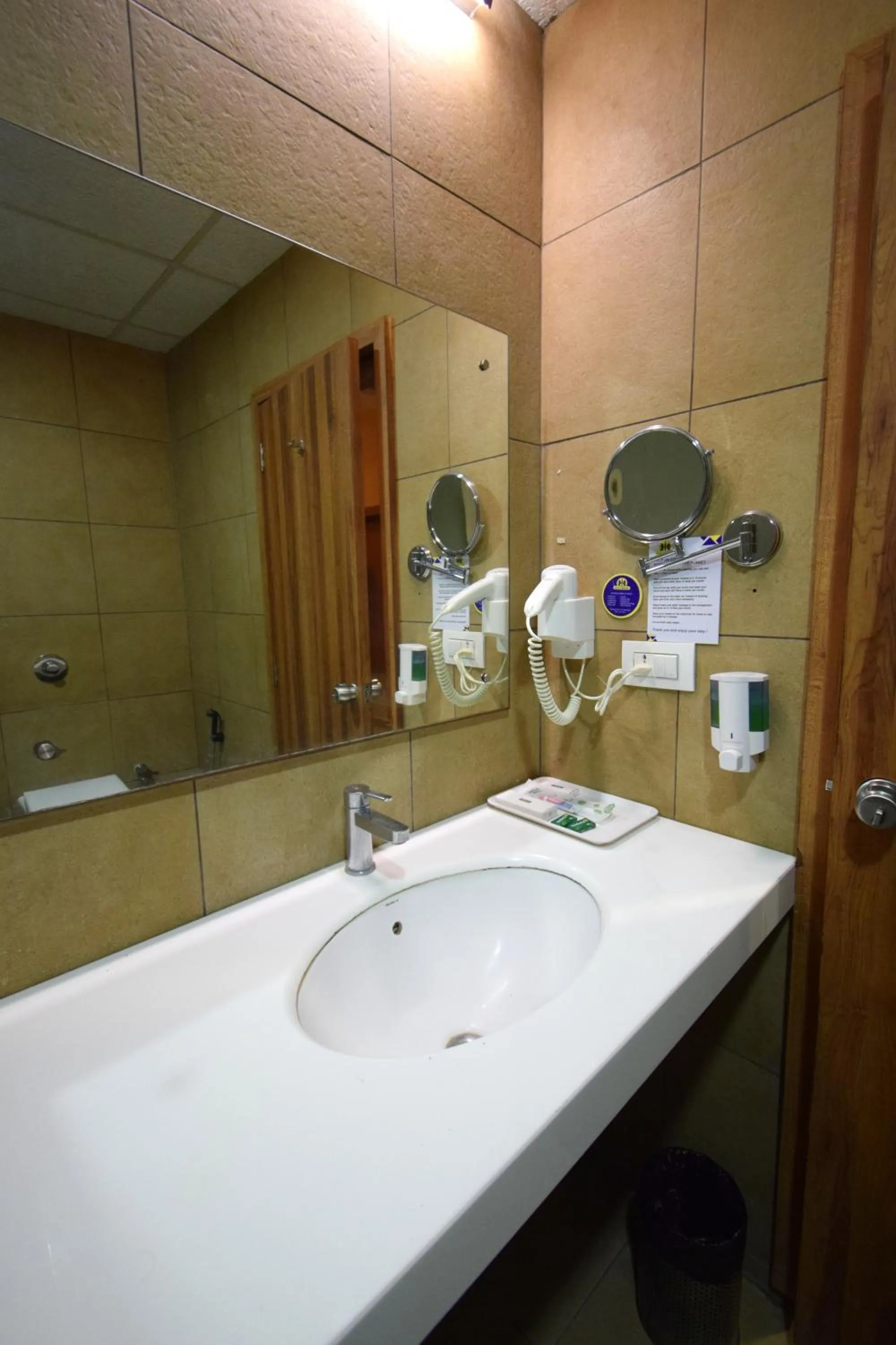 Bathroom in Bapu's Resort, Dwarka