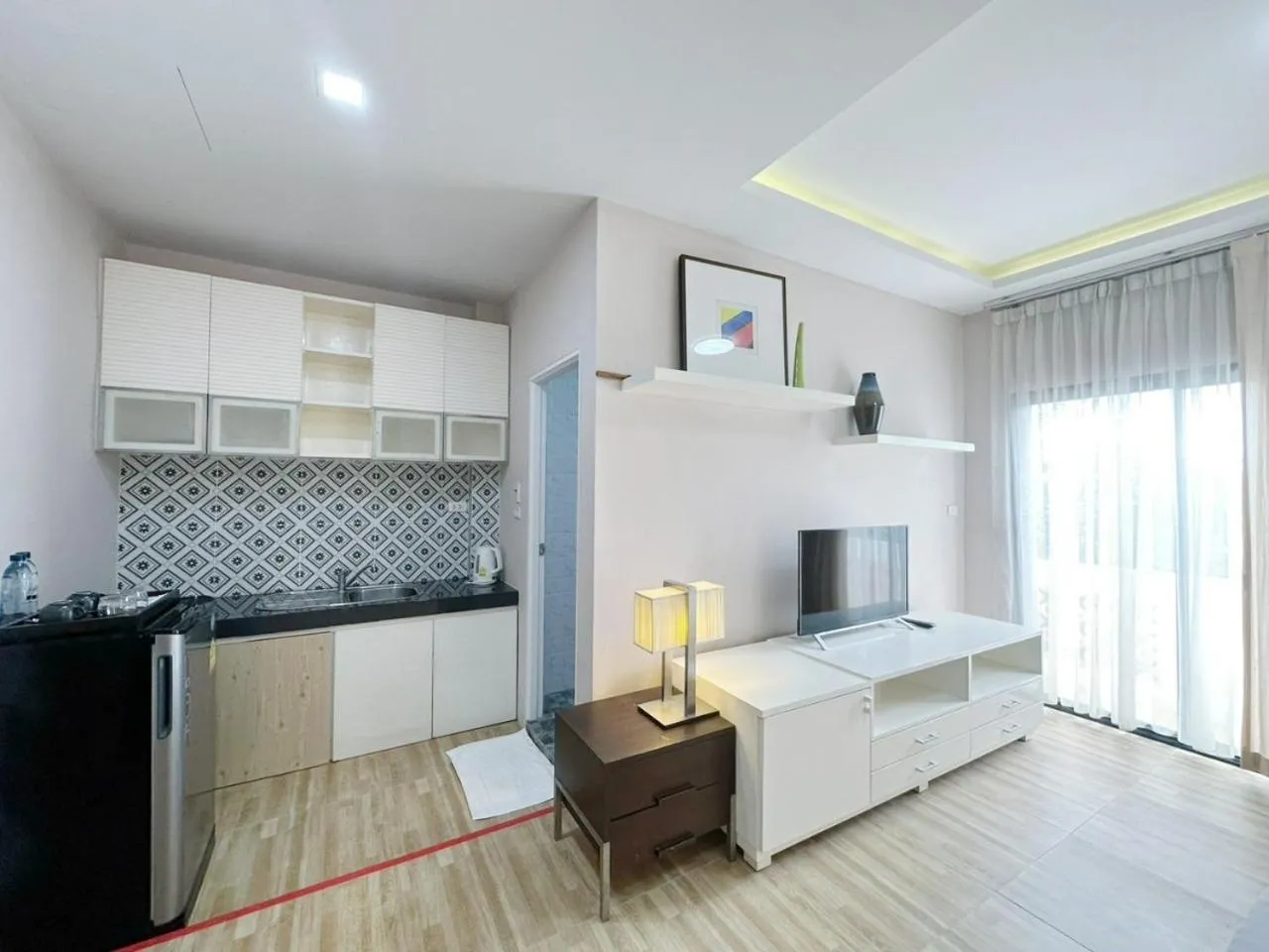 Kitchen or kitchenette, Bed in Daddy Dream Hotel and Residence