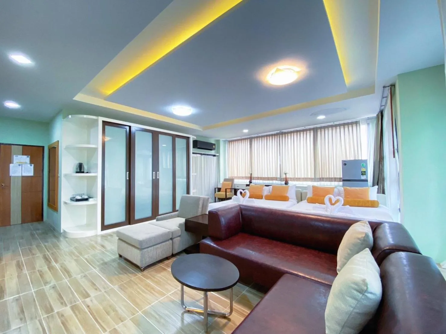 Seating area, Bed in Daddy Dream Hotel and Residence