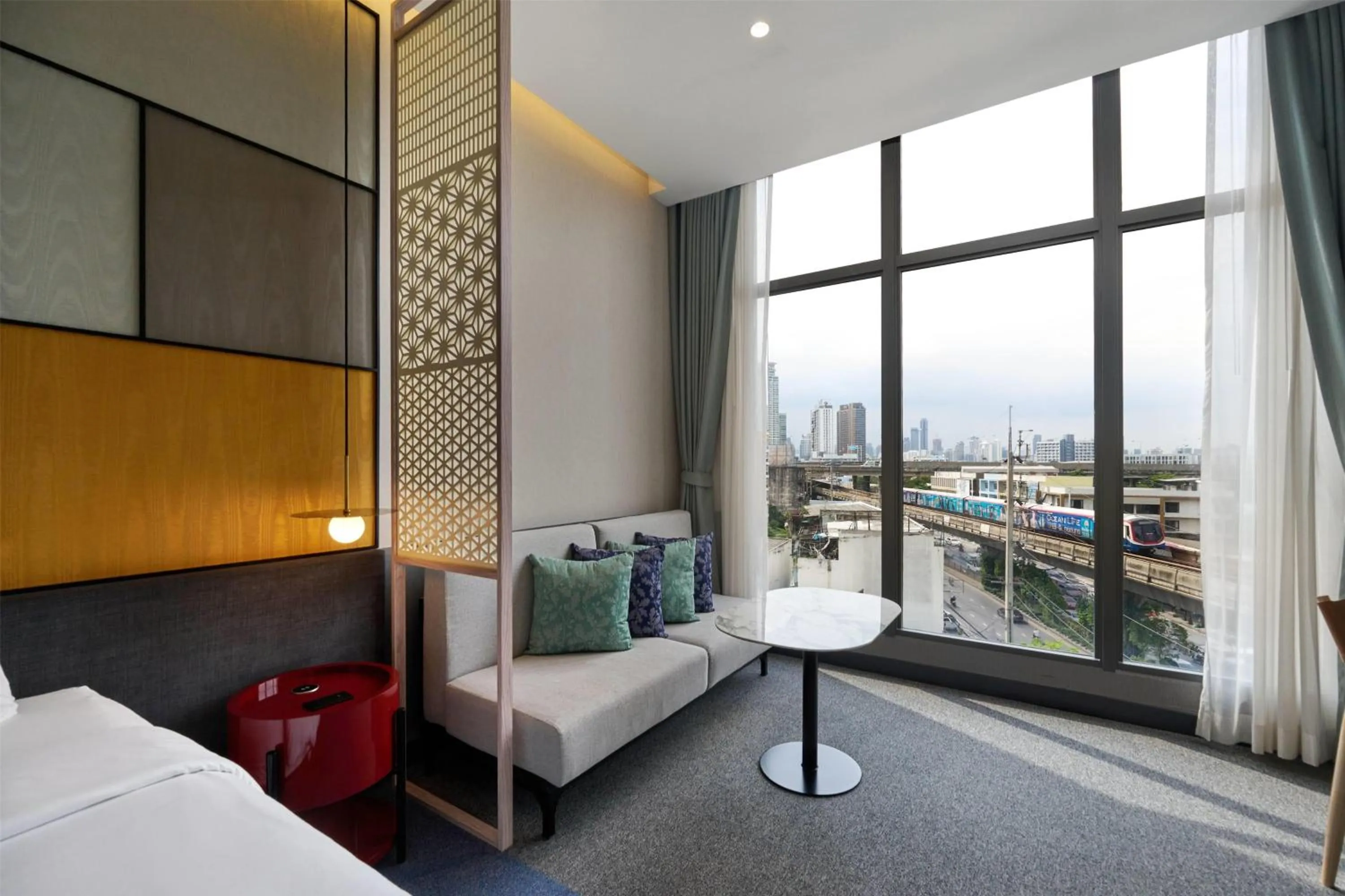 Photo of the whole room, Bed in Ramada Plaza by Wyndham Bangkok Sukhumvit 48