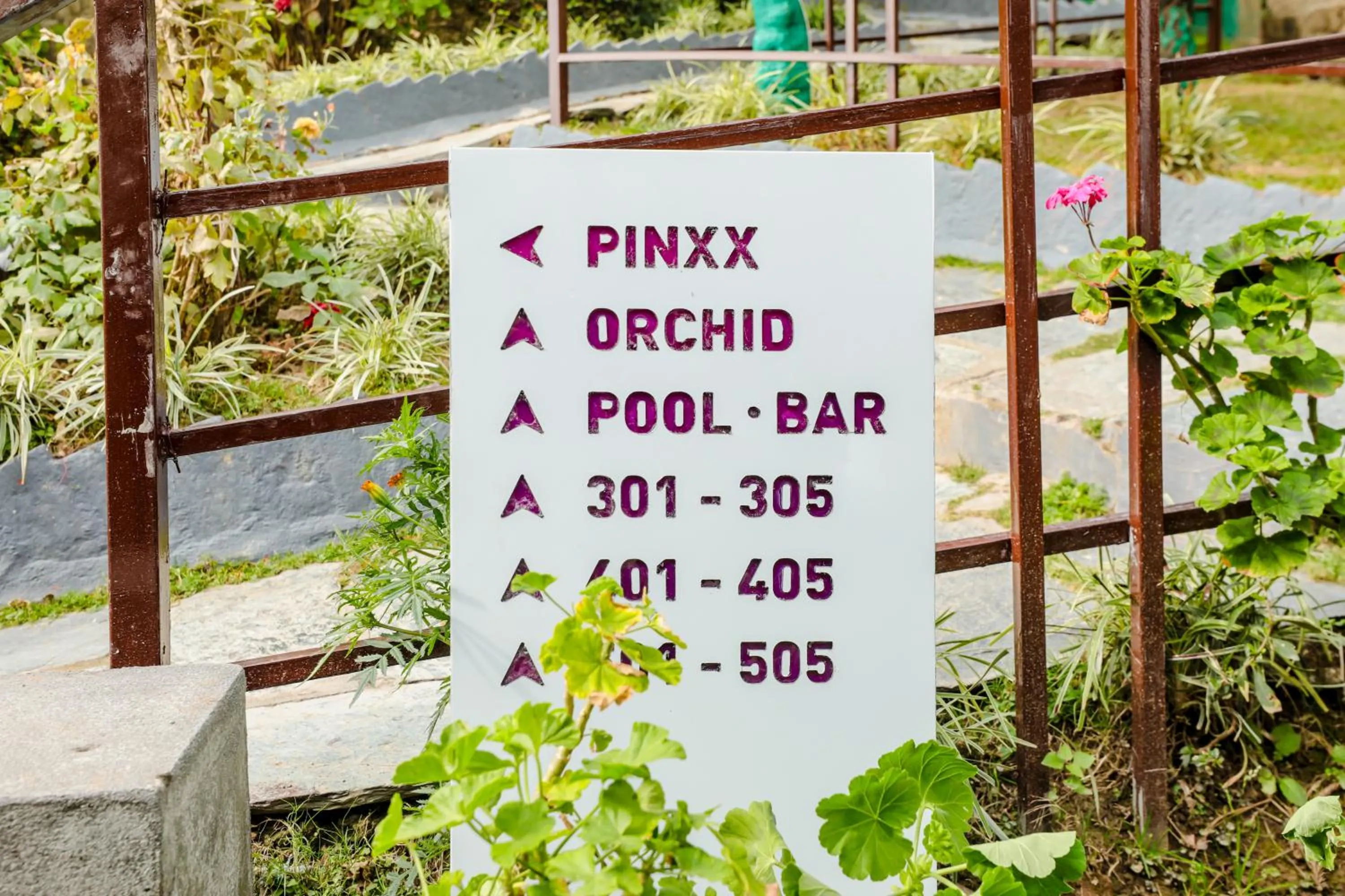 Property logo or sign in Regenta Resort Exotica Dharamshala on Hilltop