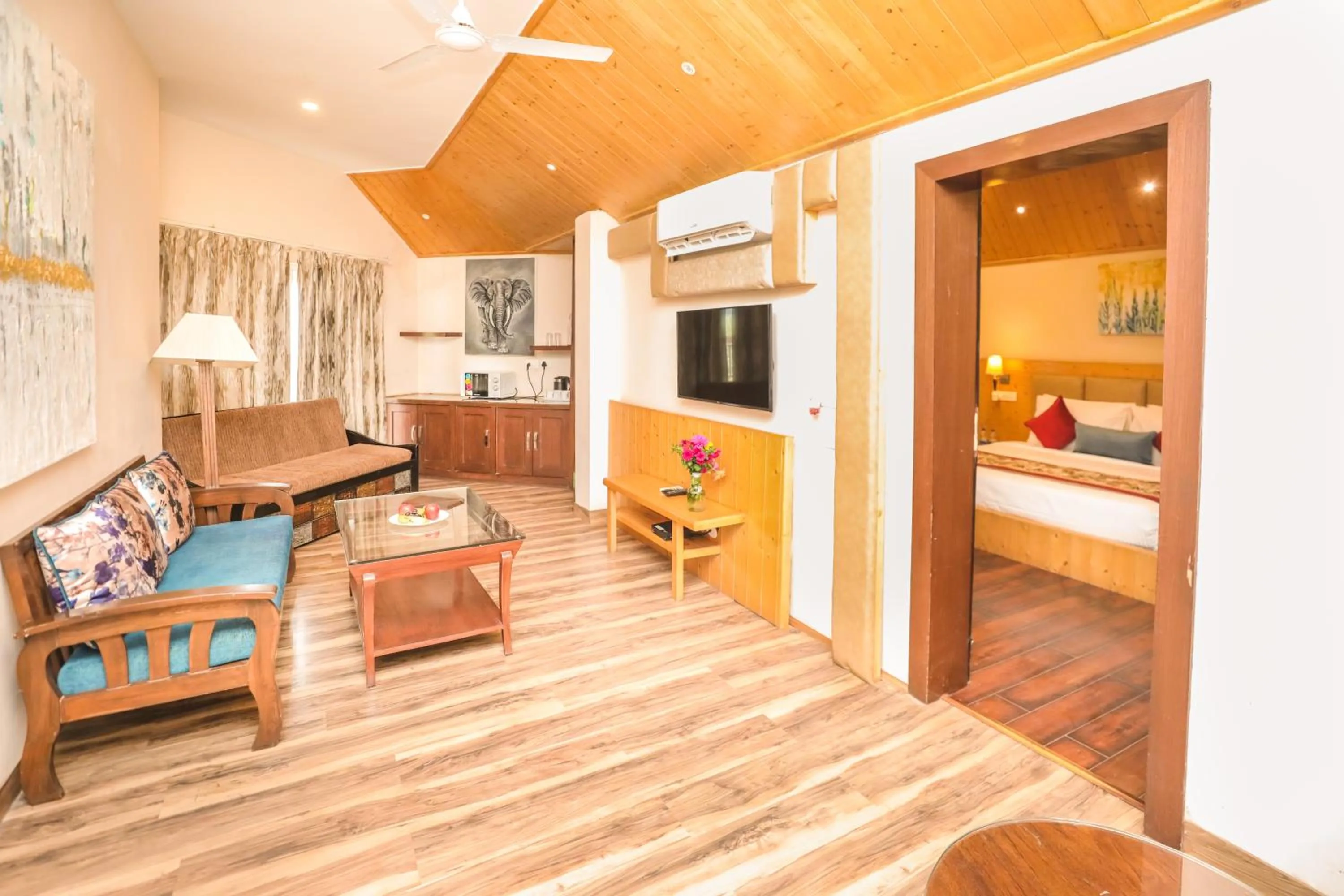 Living room, Bed in Regenta Resort Exotica Dharamshala on Hilltop