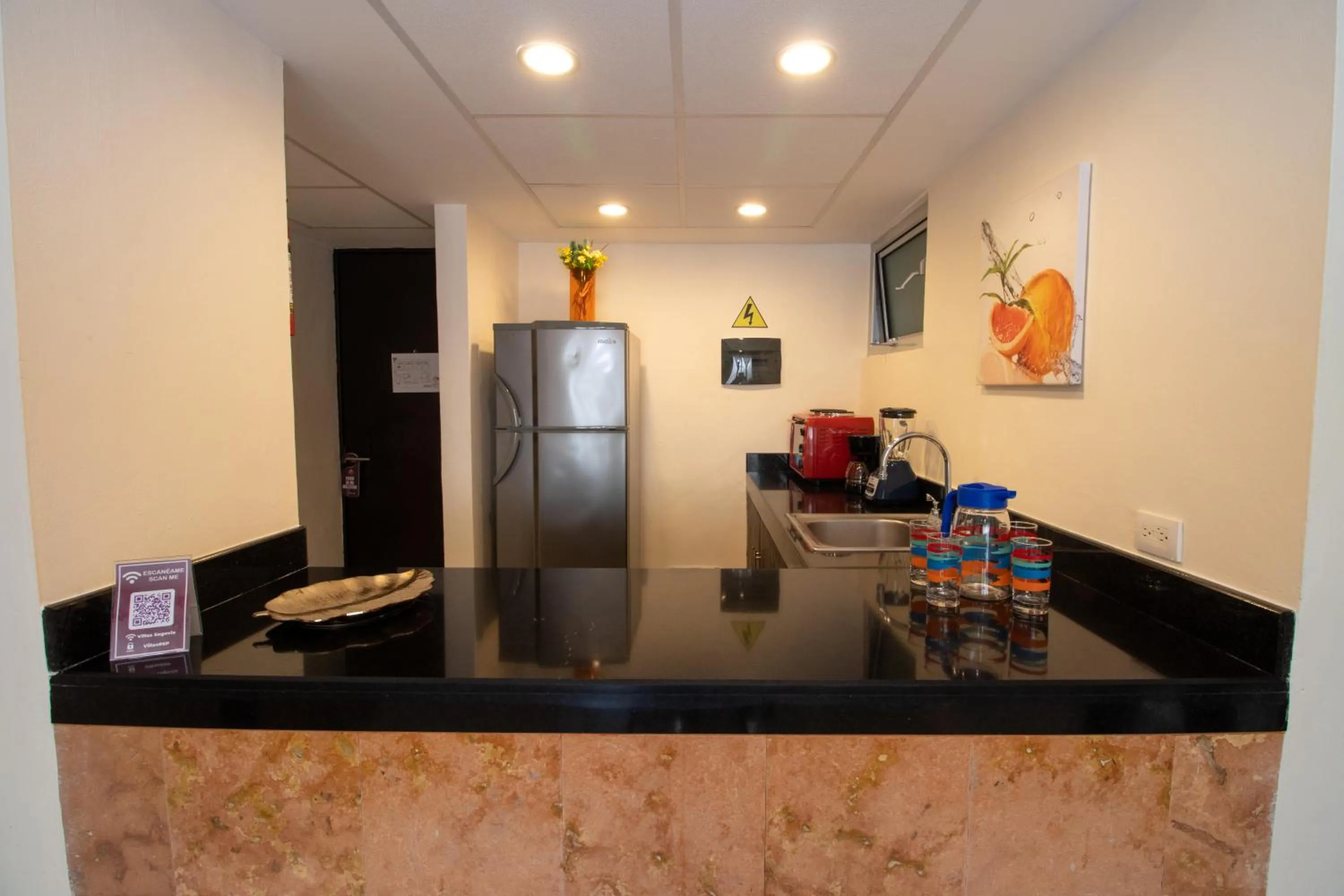 Kitchen or kitchenette in Hotel Villas Segovia Playa del Carmen