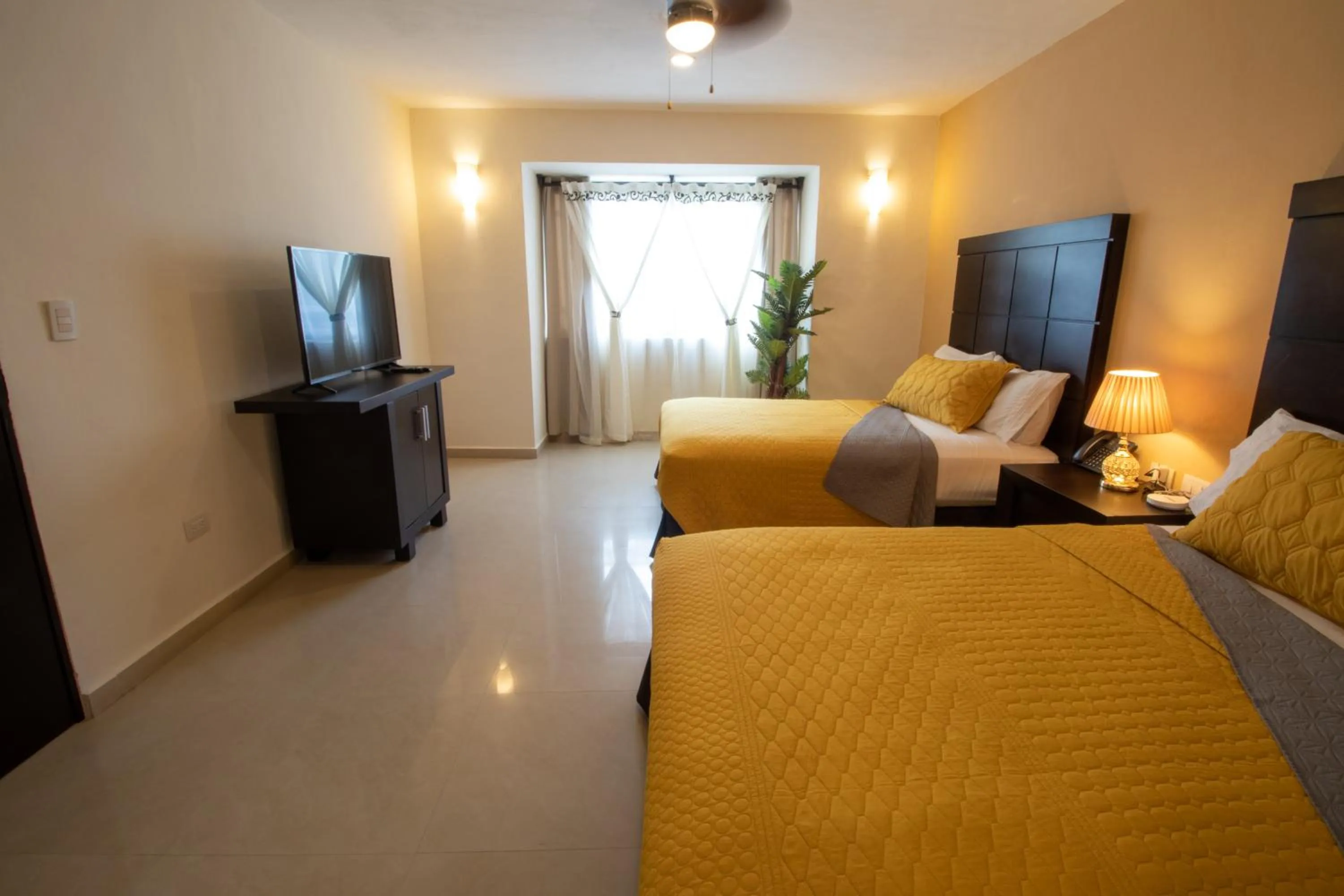 Photo of the whole room, Bed in Hotel Villas Segovia Playa del Carmen