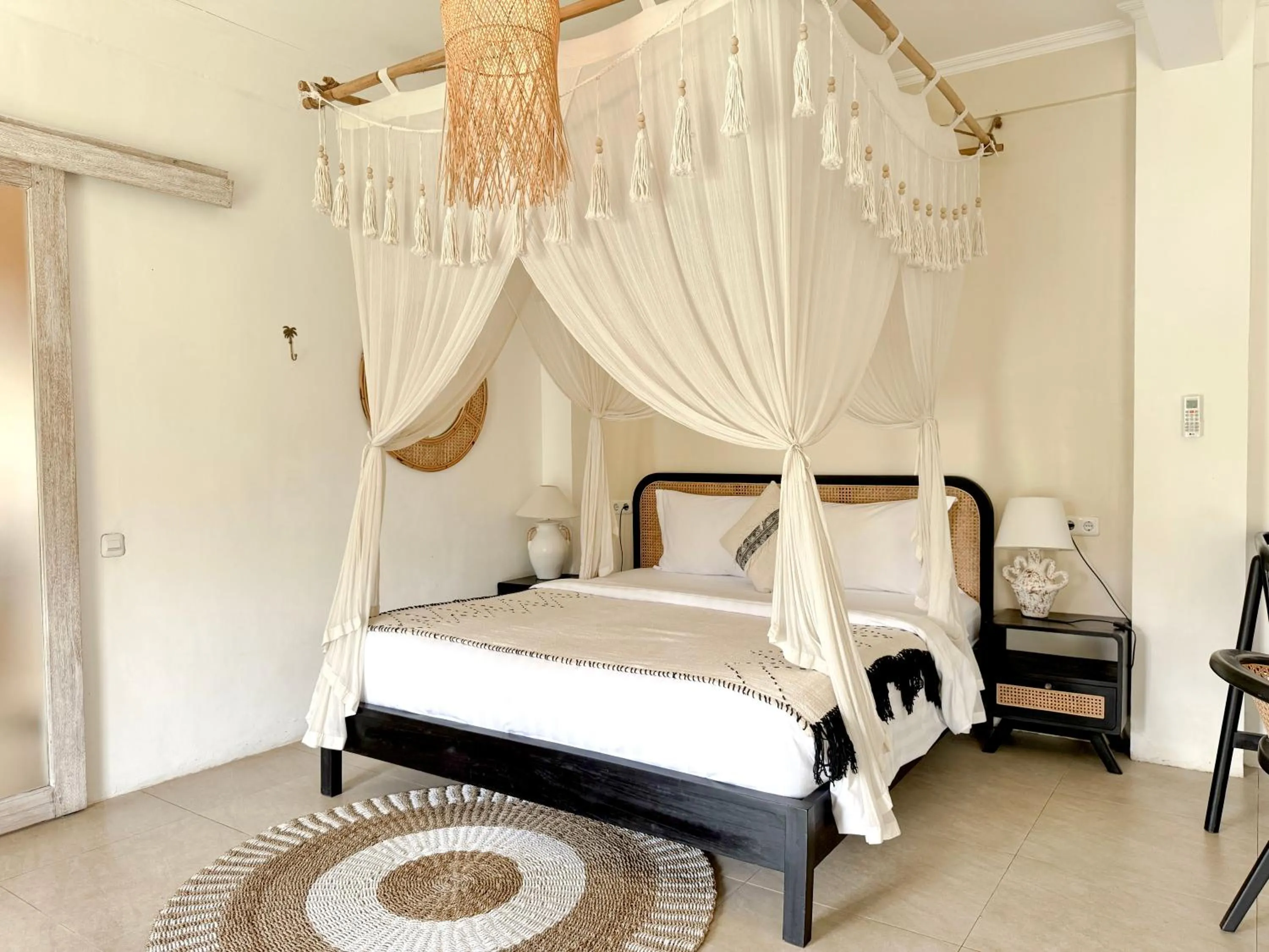 Bed in Hot Stone Club Ubud