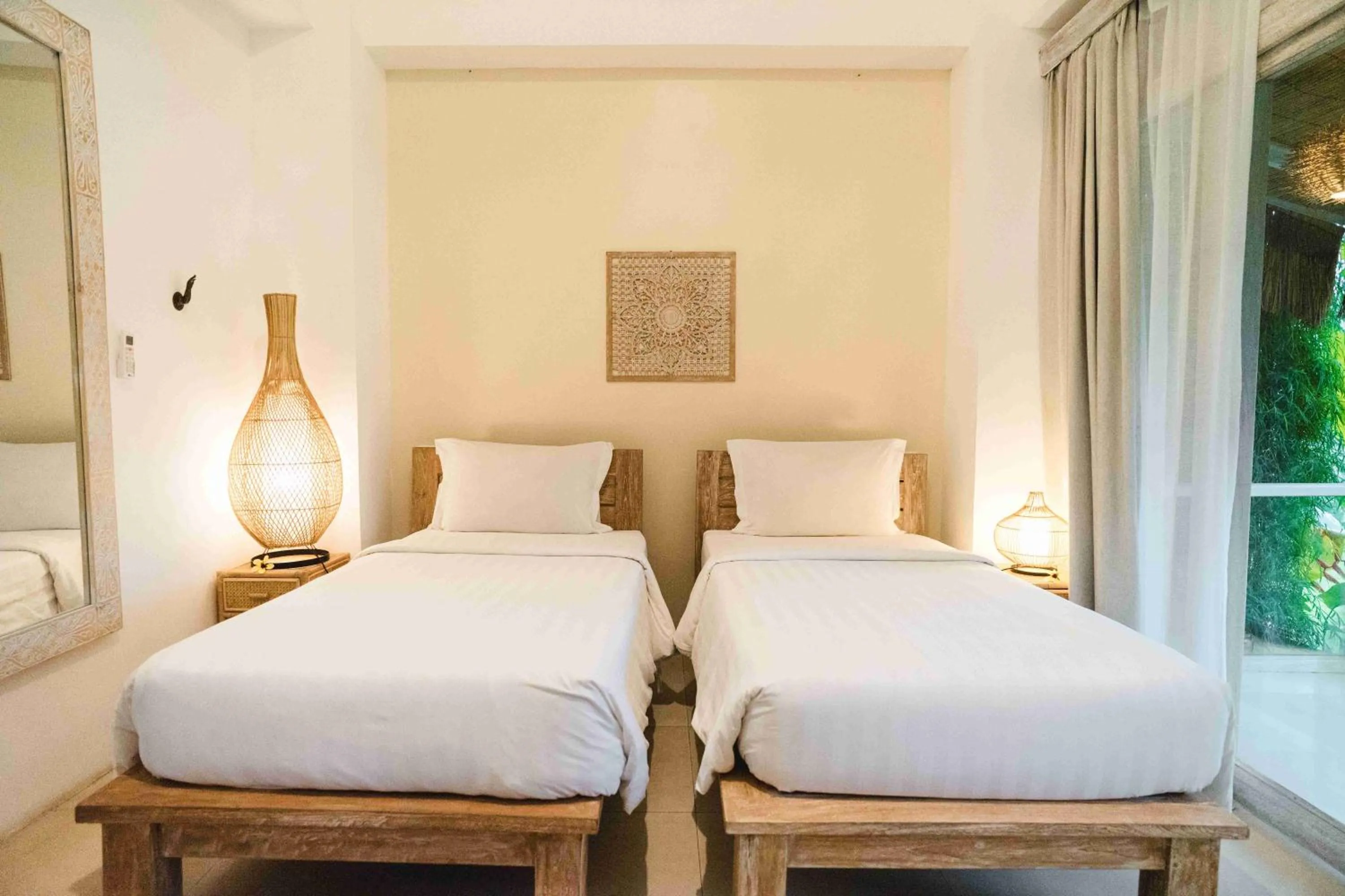 Bed in Hot Stone Club Ubud