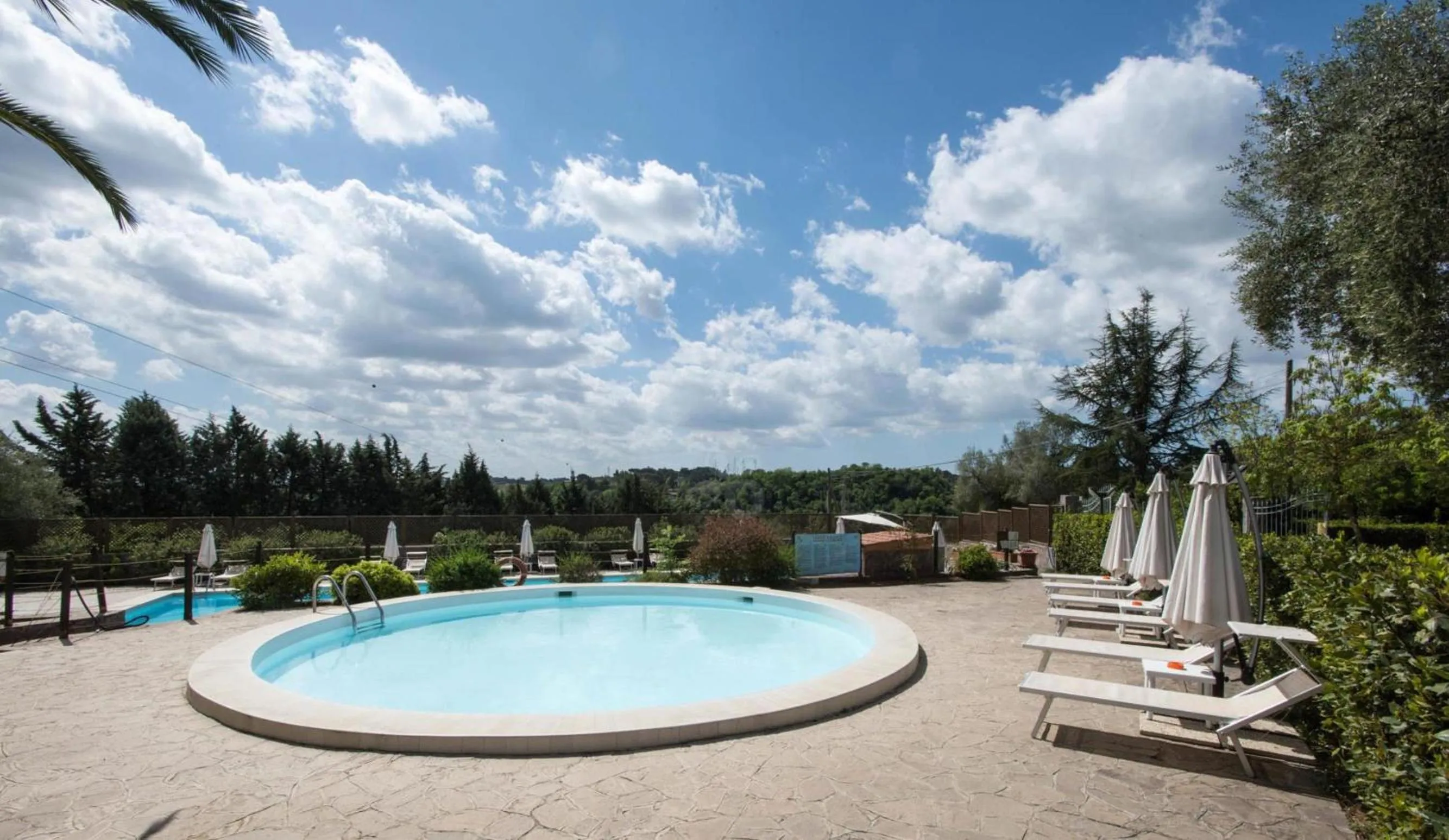 Swimming pool in Happy Village & Camping