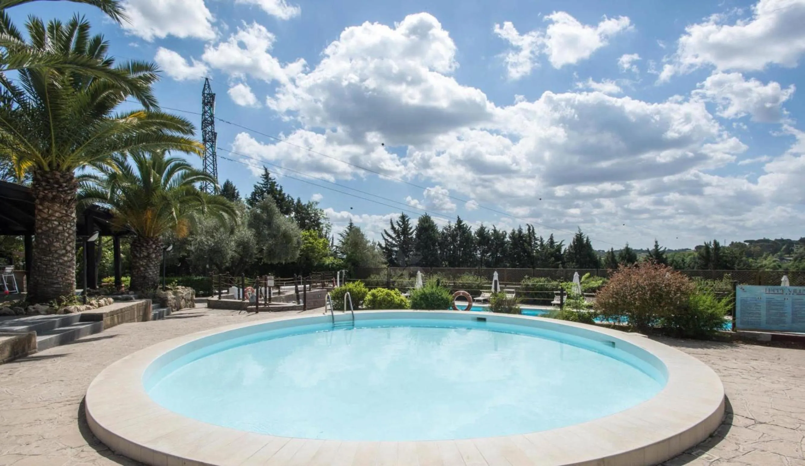 Swimming pool in Happy Village & Camping