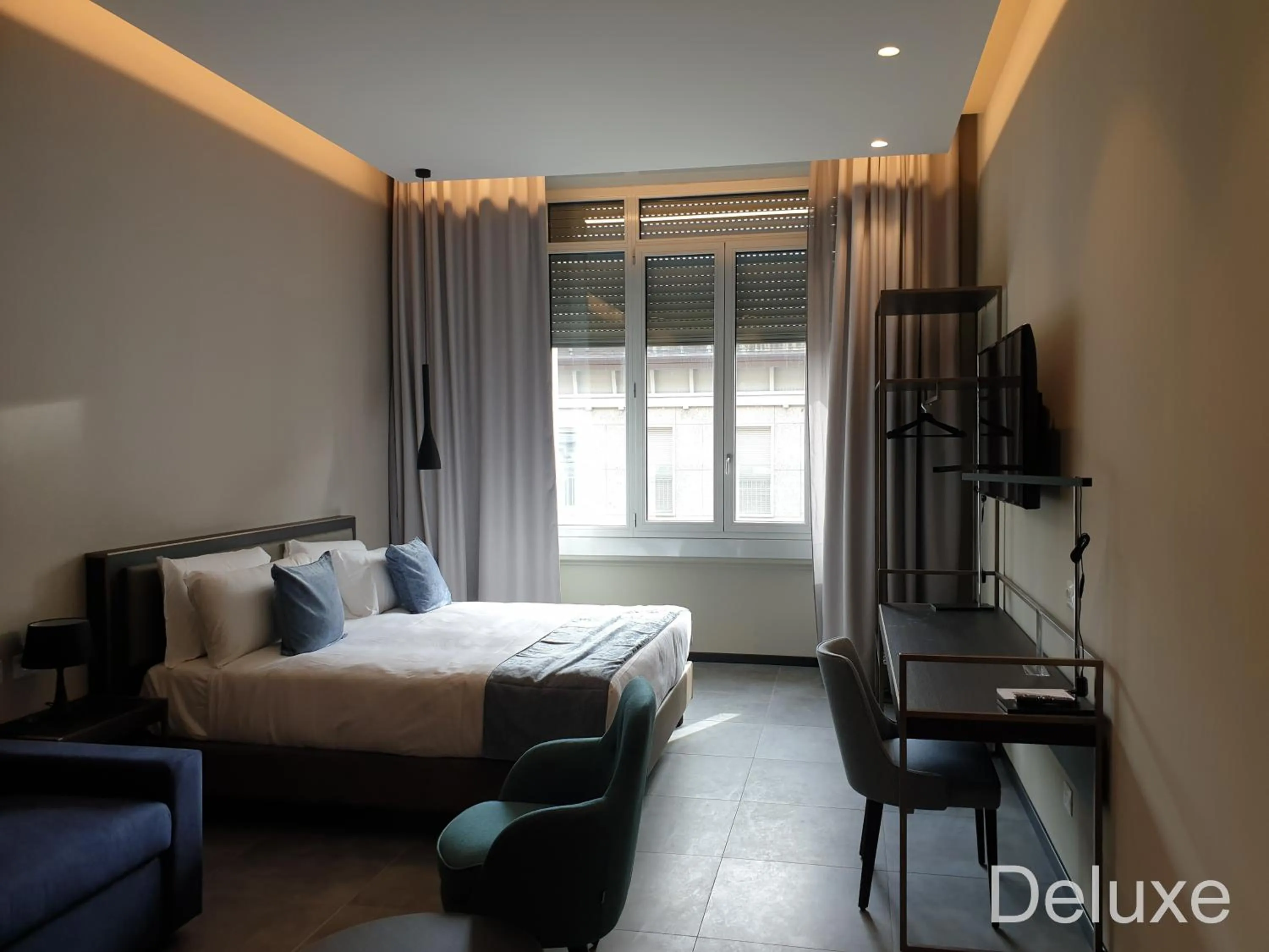 Bed in Hotel Vitruvio