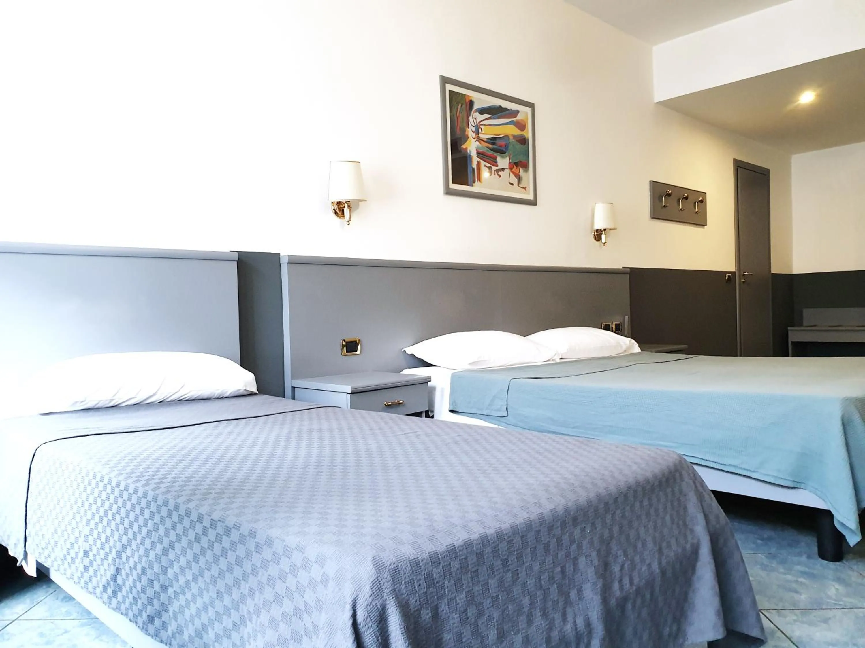 Bed in Hotel Vitruvio