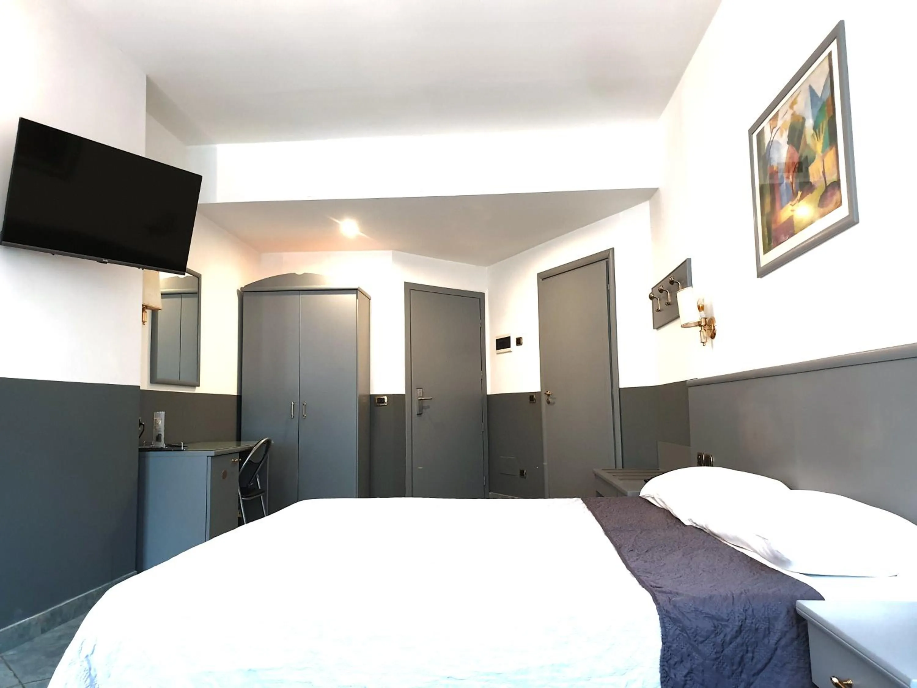 Bed in Hotel Vitruvio