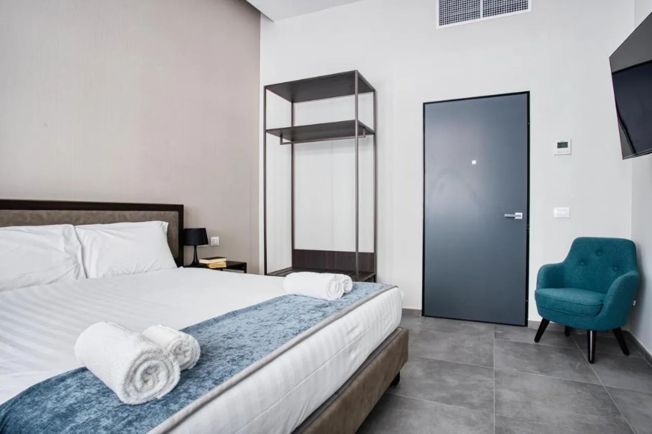 Bed in Hotel Vitruvio