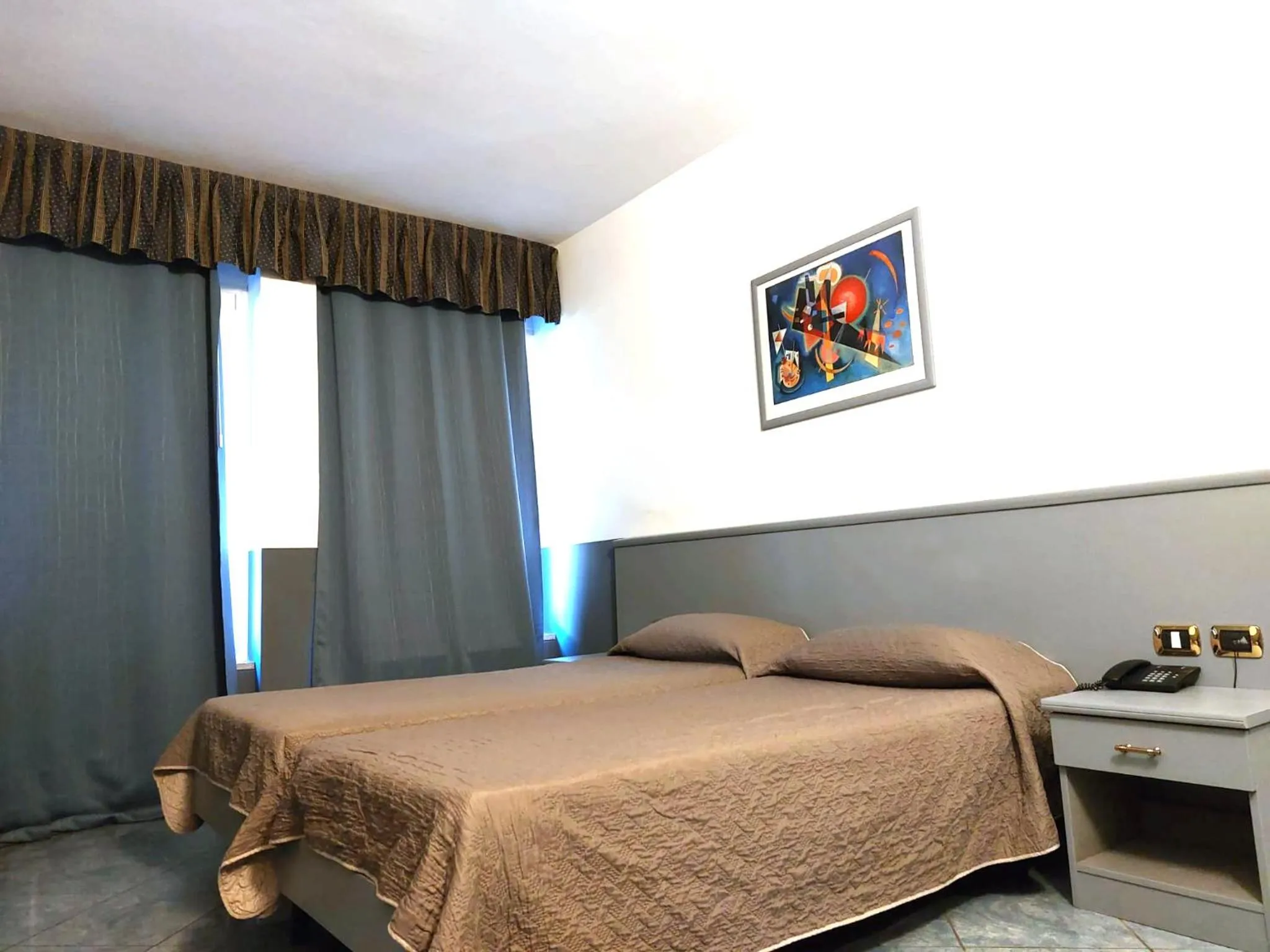 Bed in Hotel Vitruvio