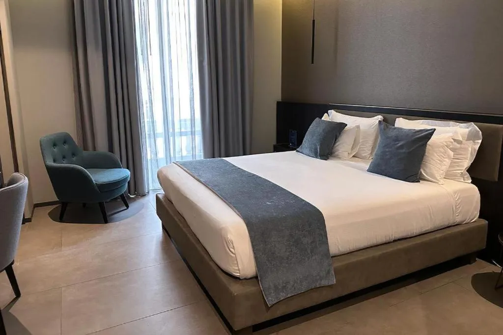 Bed in Hotel Vitruvio