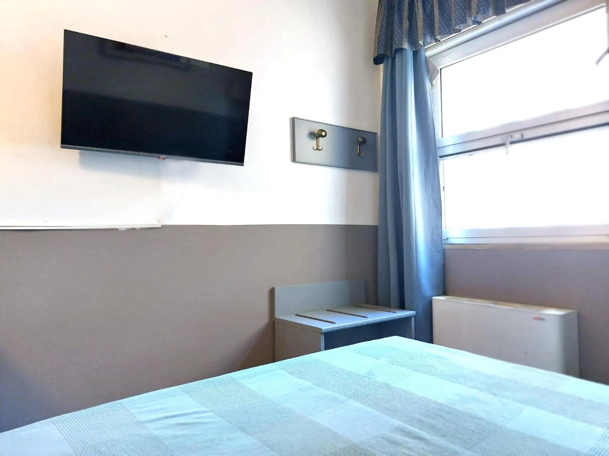 TV and multimedia, Bed in Hotel Vitruvio