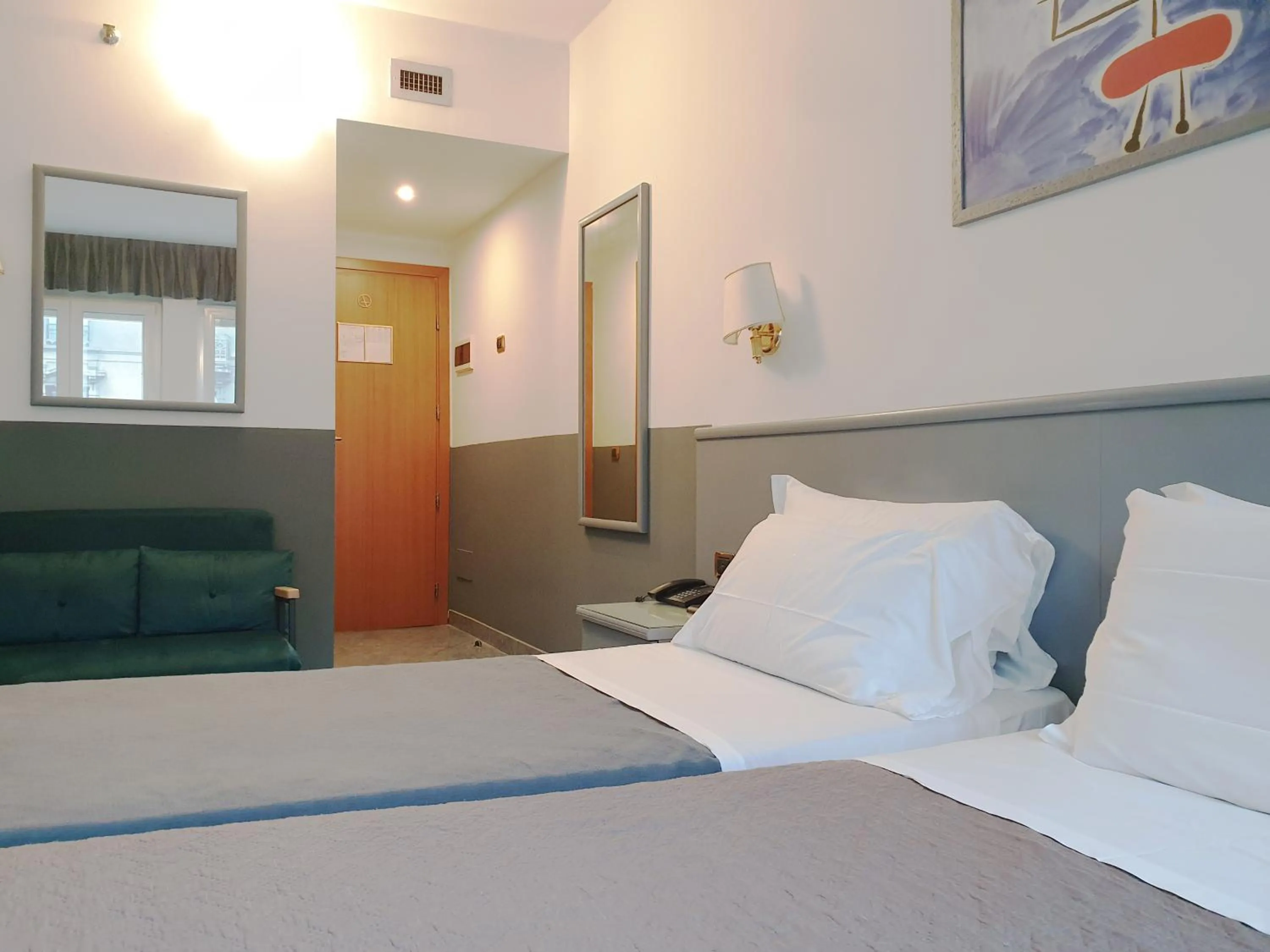 Bed in Hotel Vitruvio