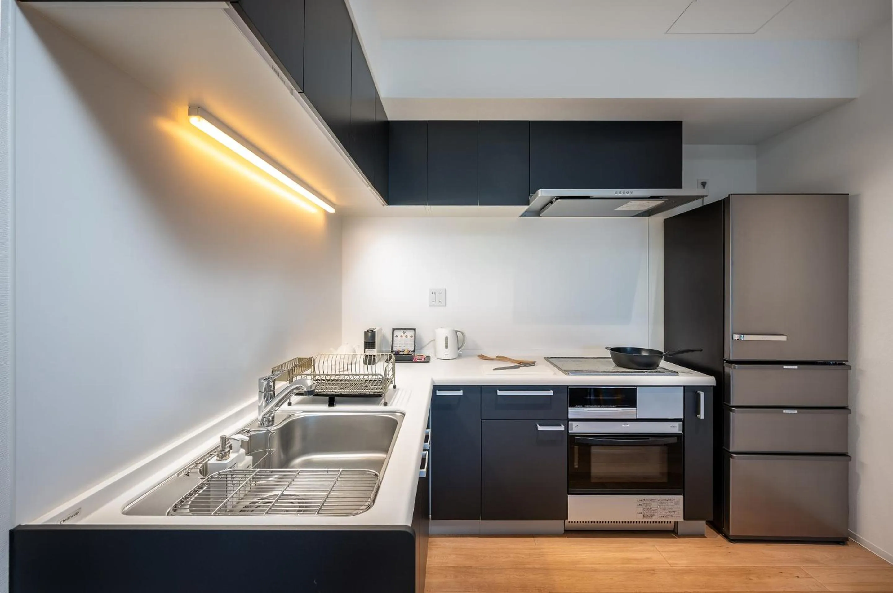 kitchen in Kaku Place by H2 Life