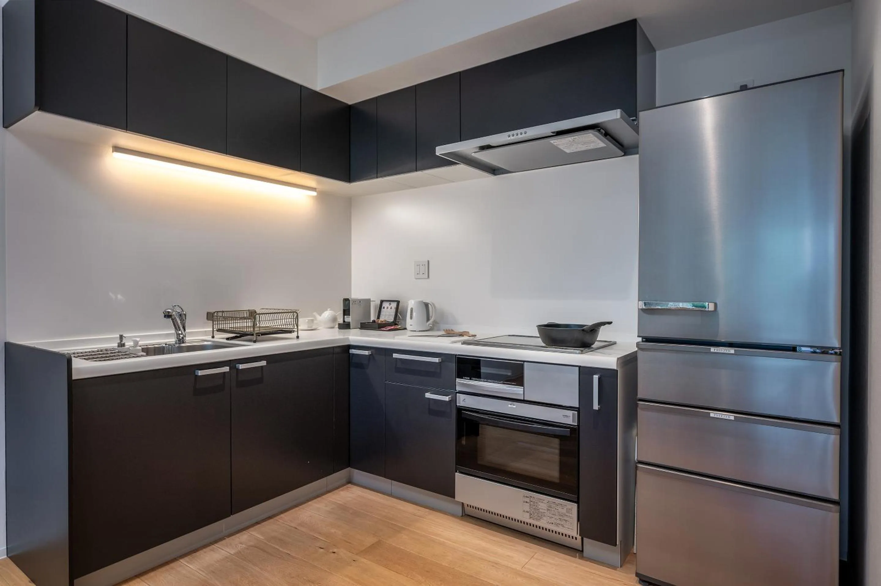 kitchen in Kaku Place by H2 Life