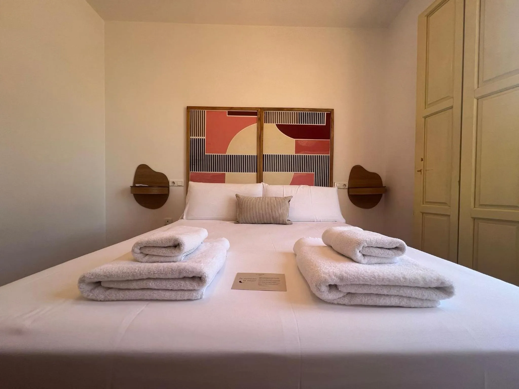 Bed in Thyssen Boutique Apartments by Caleta Homes