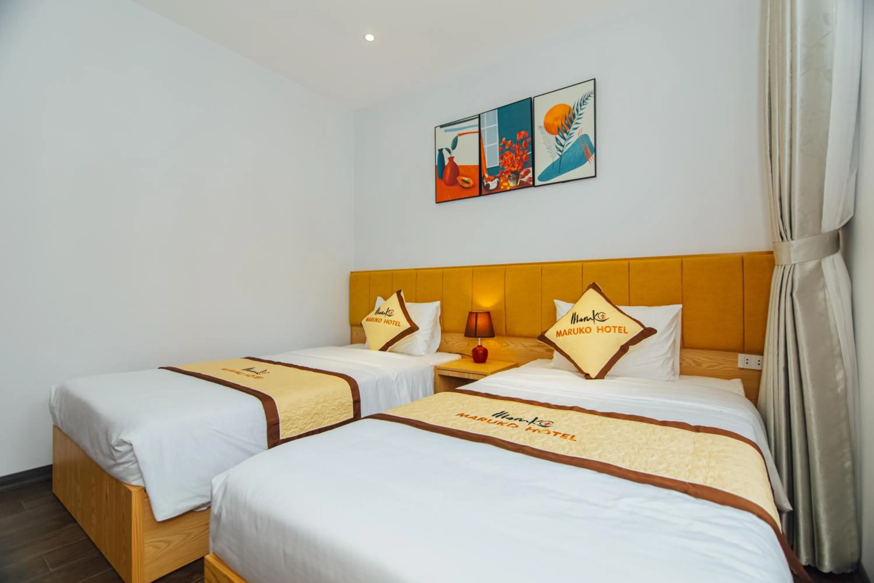 Bed in Maruko Hạ Long Hotel