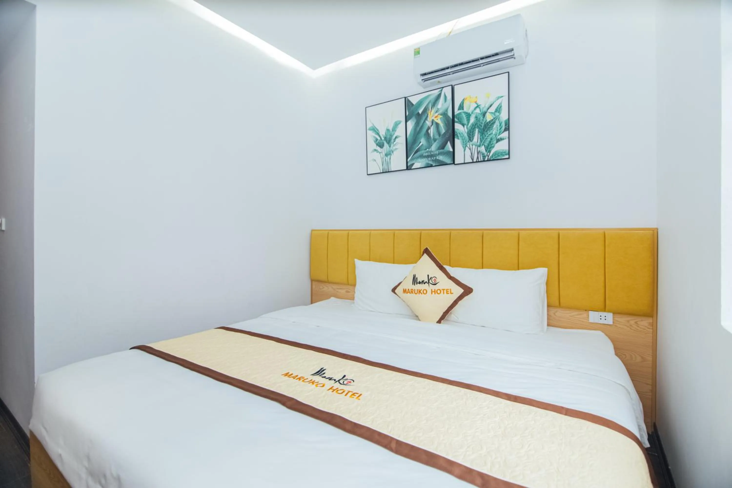 Bed in Maruko Hạ Long Hotel