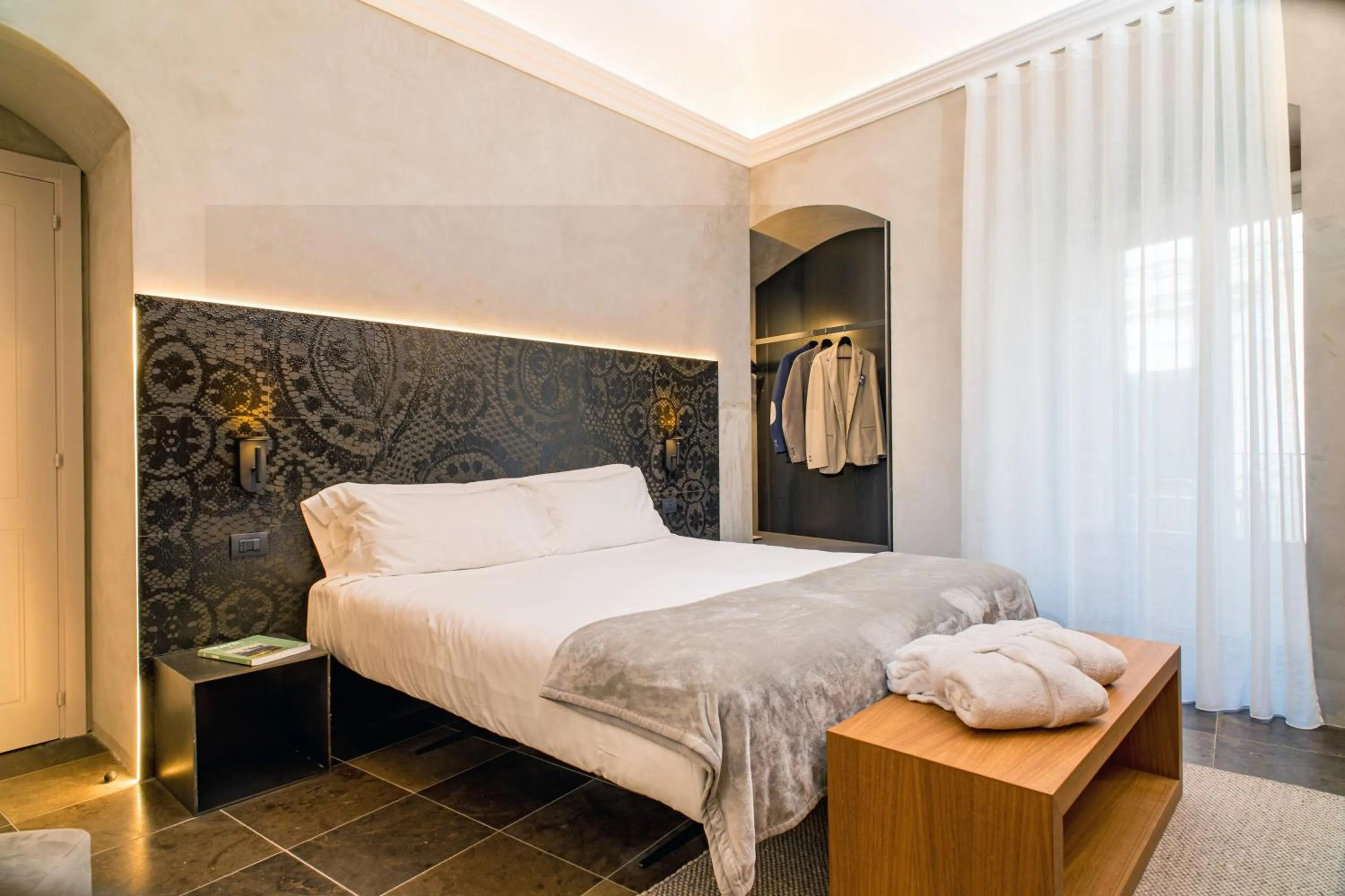 Bed in Locanda Don Serafino Historical Boutique Hotel