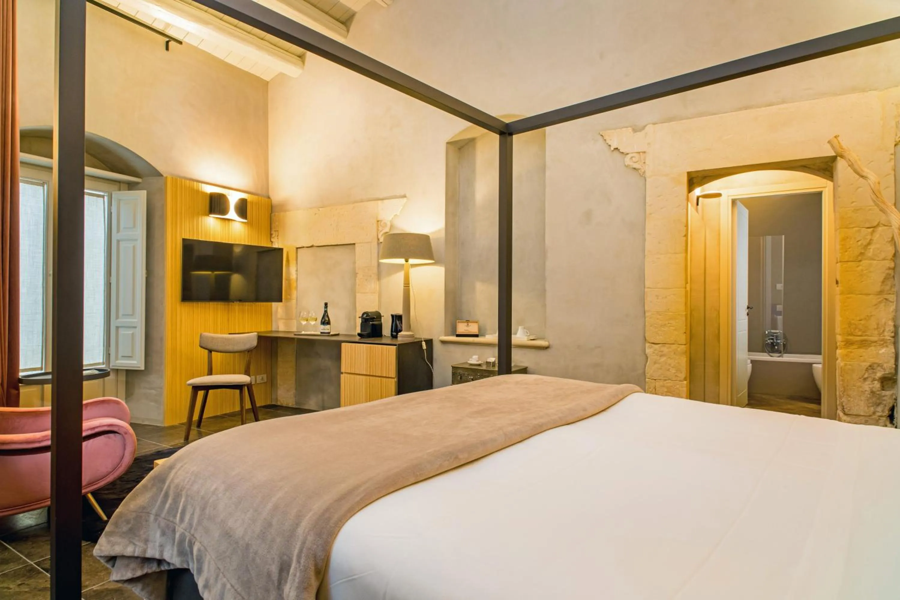 Photo of the whole room, Bed in Locanda Don Serafino Historical Boutique Hotel