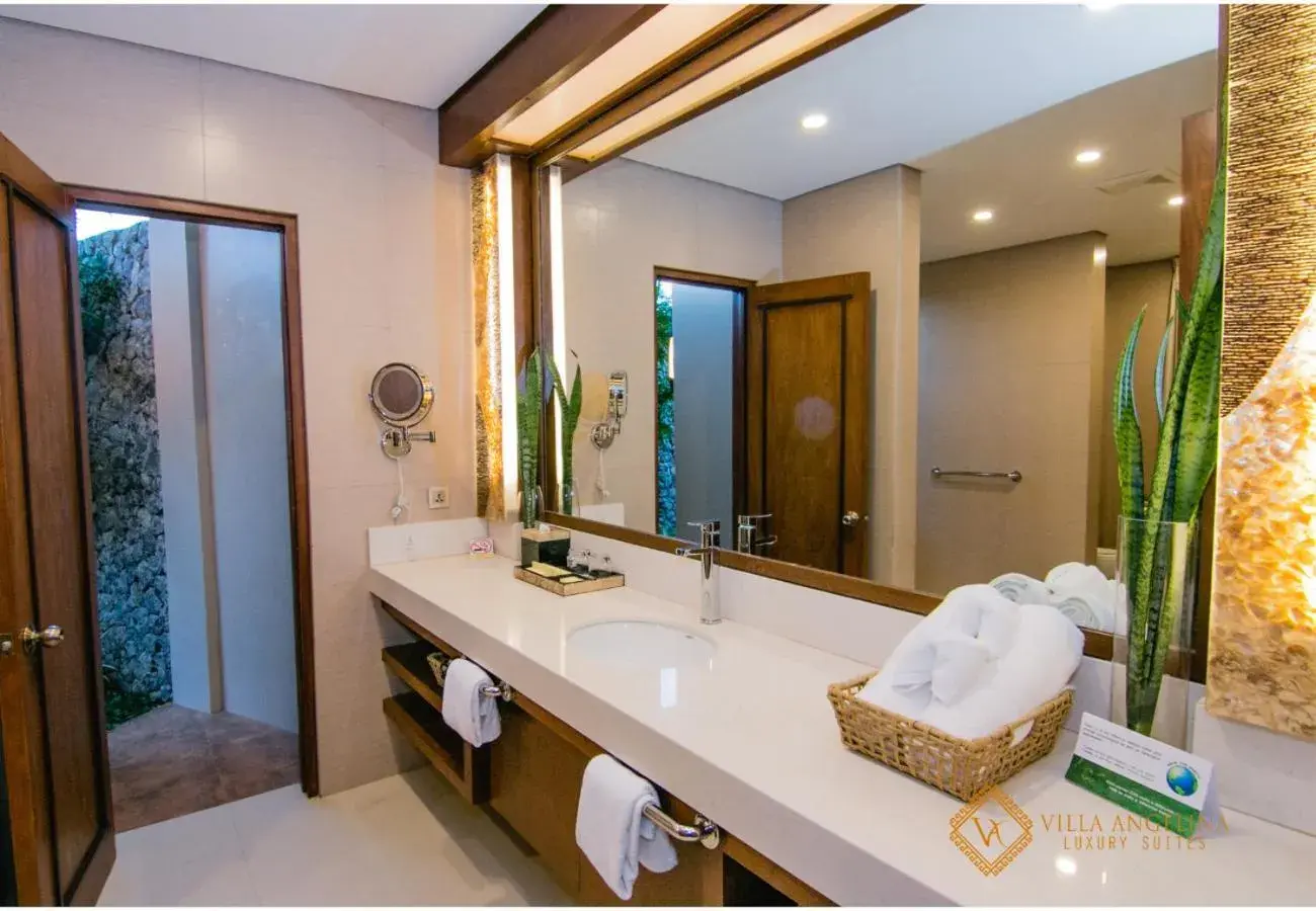 Standard Triple Room with Sea View in Villa Angelina Luxury Suites Standard Triple Room with Sea View in Villa Angelina Luxury Suites