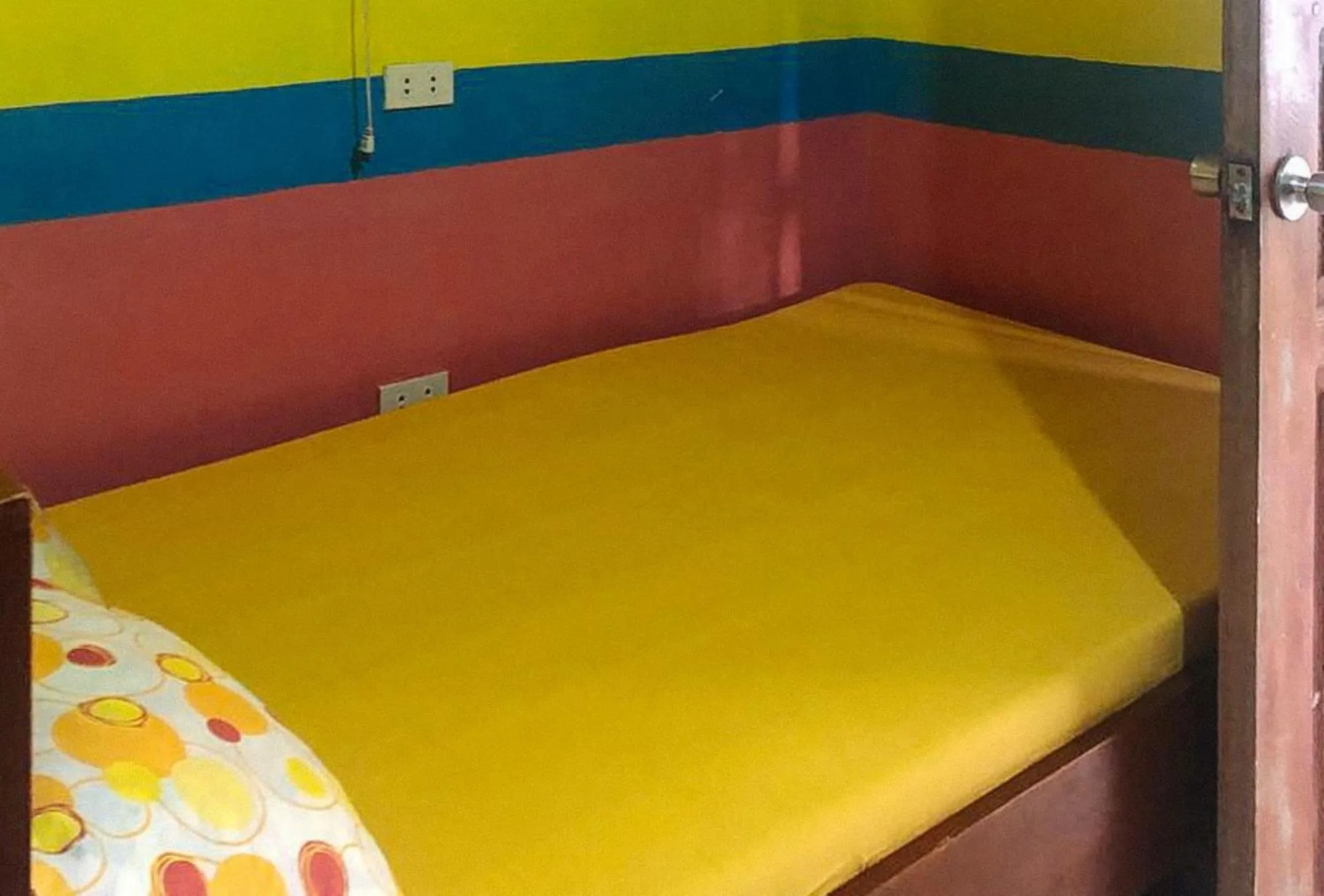 Bed in RedDoorz at Precious Dem Beach Resort Pagudpud