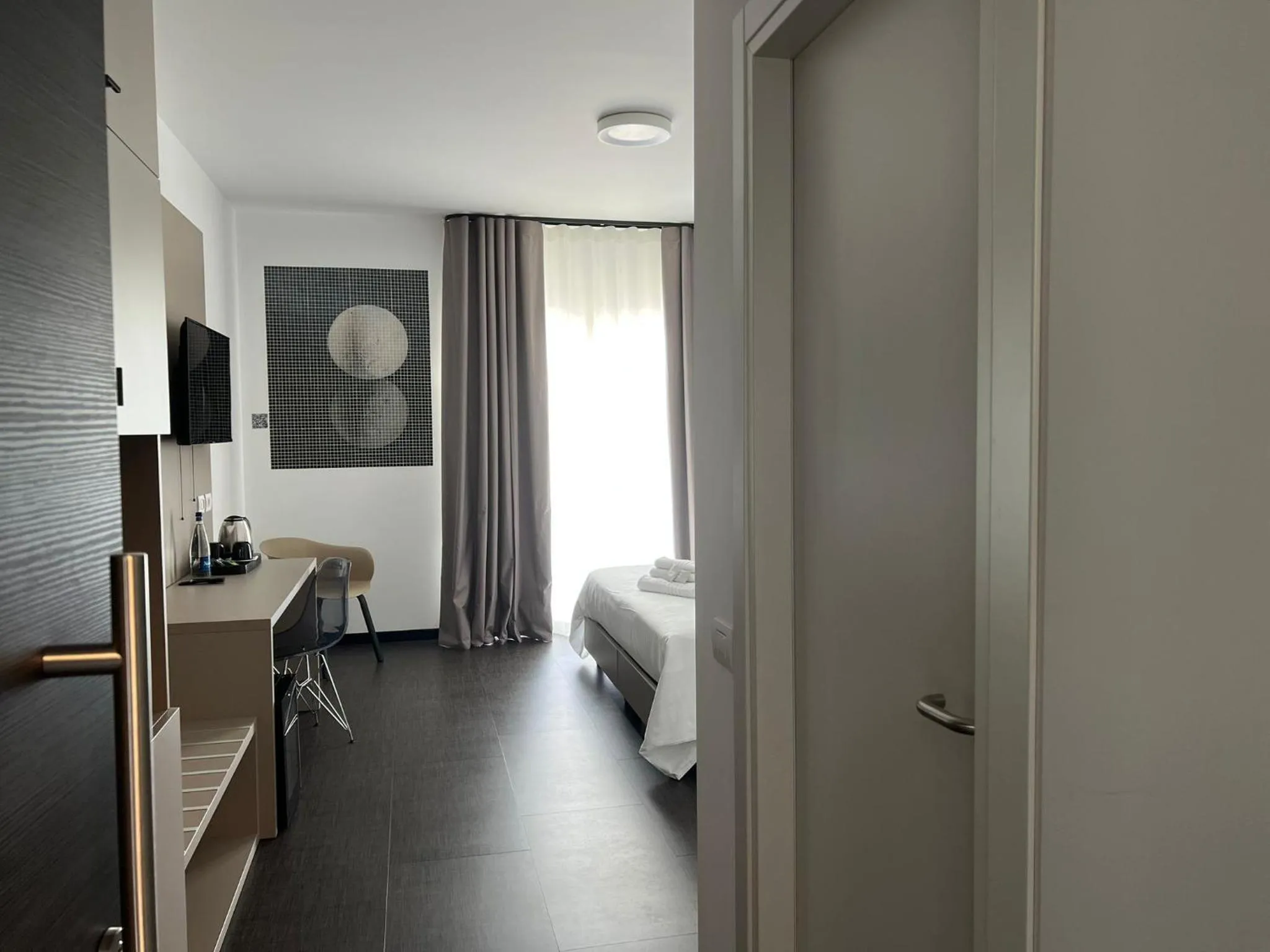 Bed in HOTEL MOSAICO