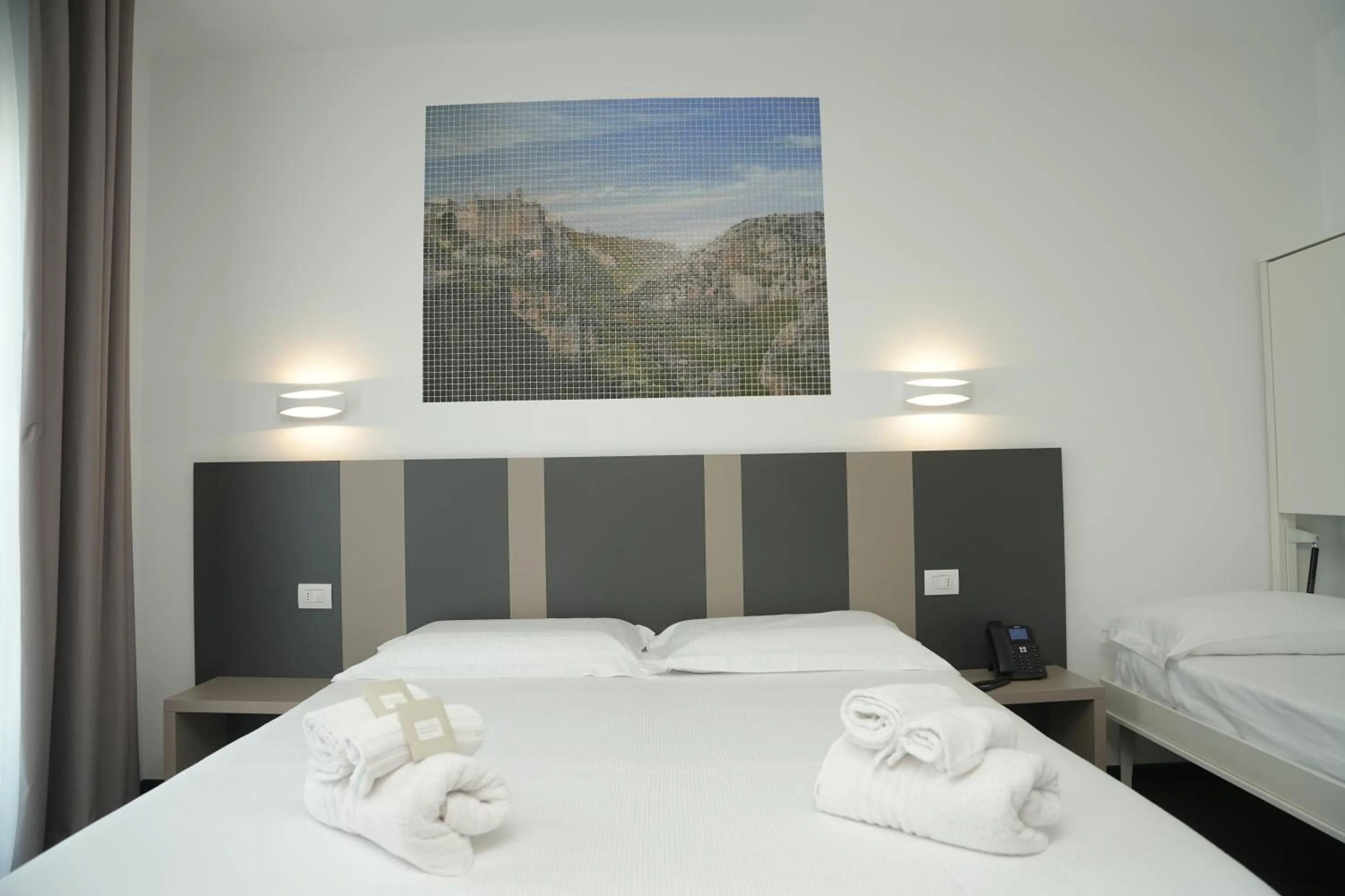 Bed in HOTEL MOSAICO