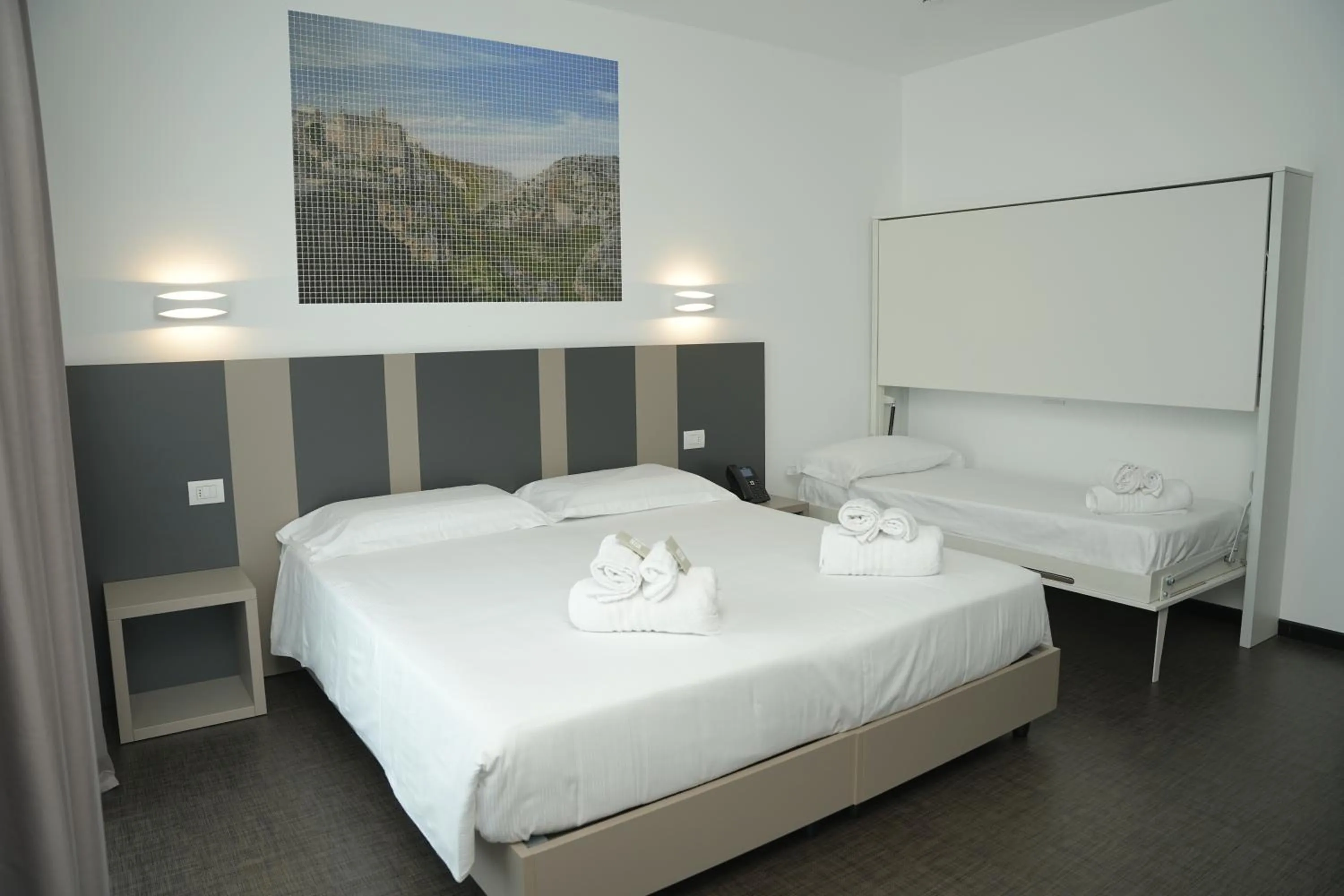 Bed in HOTEL MOSAICO