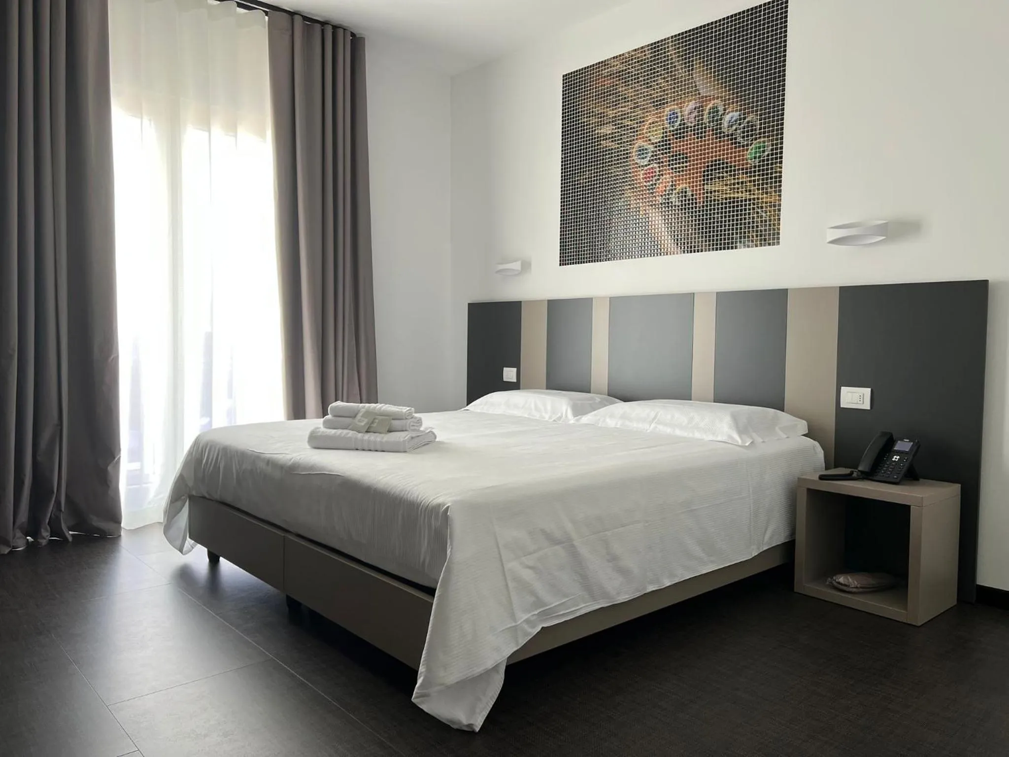 Bed in HOTEL MOSAICO