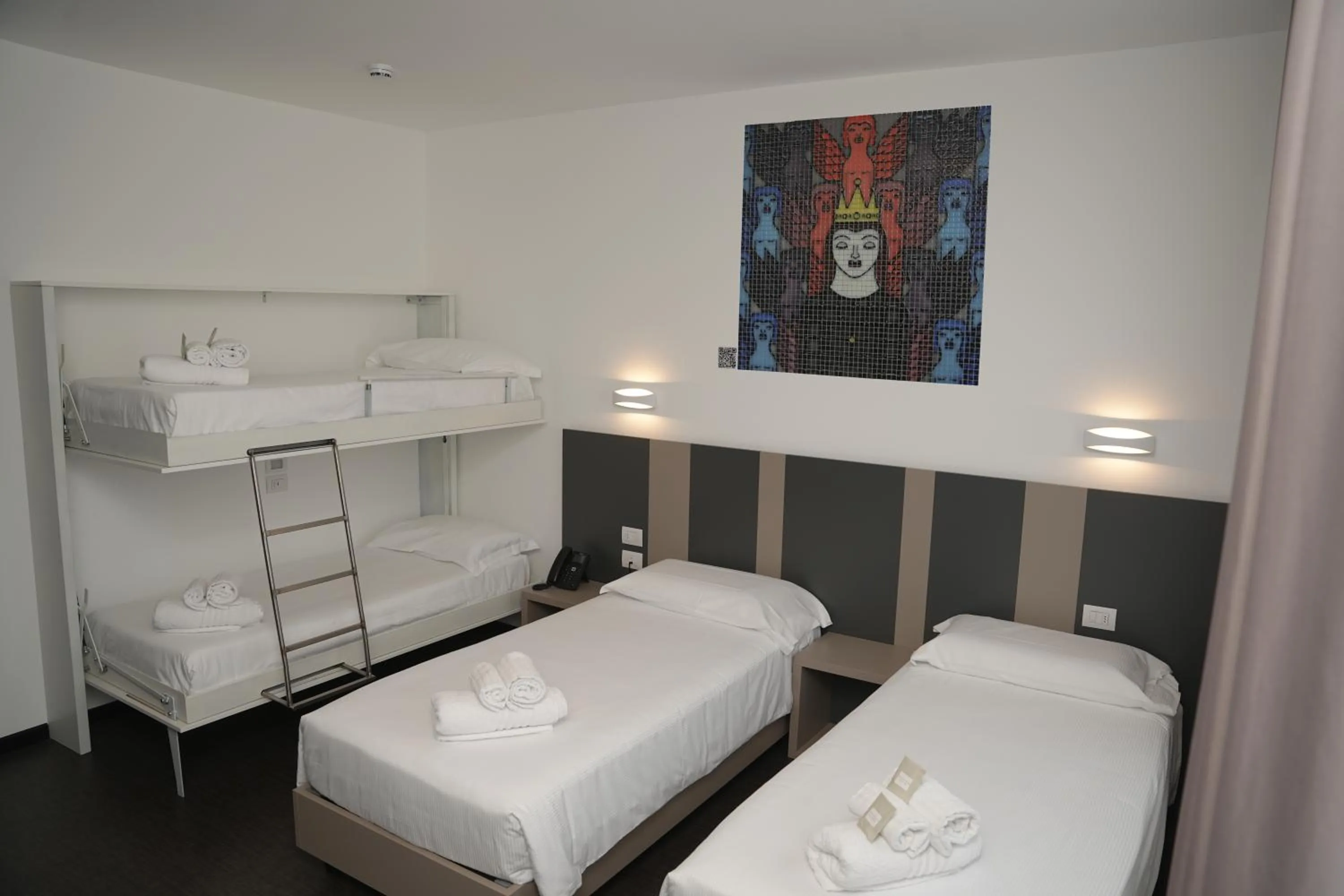 Bed in HOTEL MOSAICO