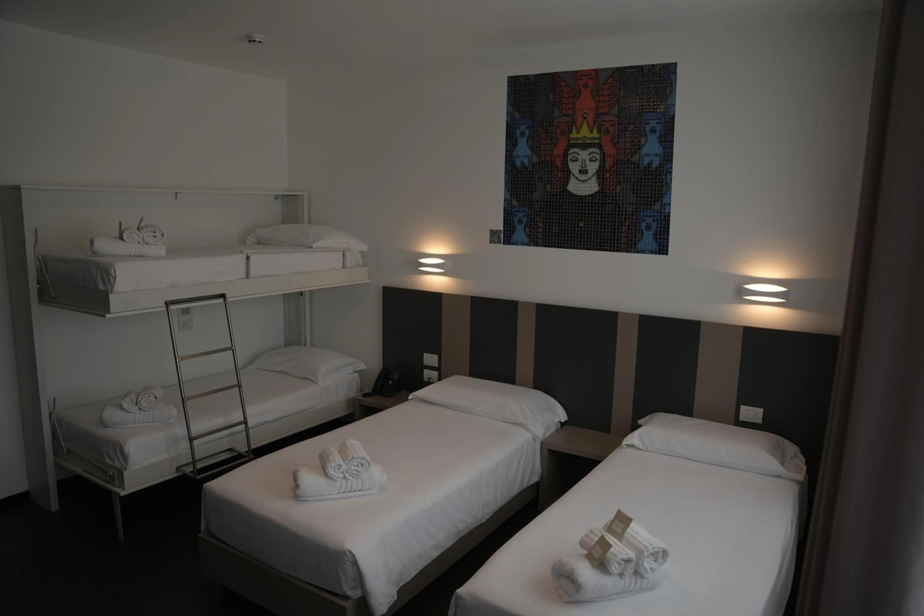 Bed in HOTEL MOSAICO