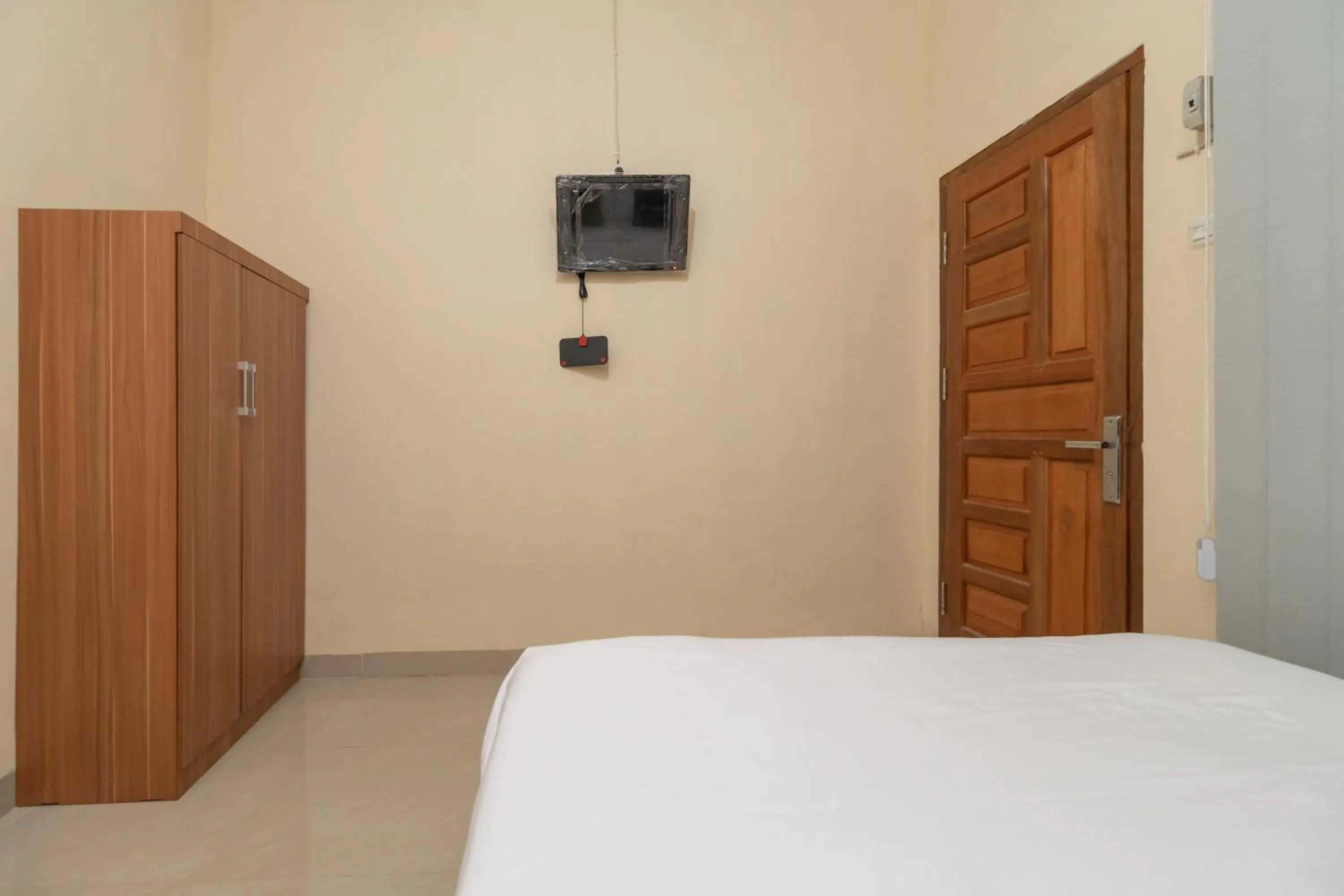 Bedroom, Bed in Urbanview Hotel Salsabilah Palembang by RedDoorz