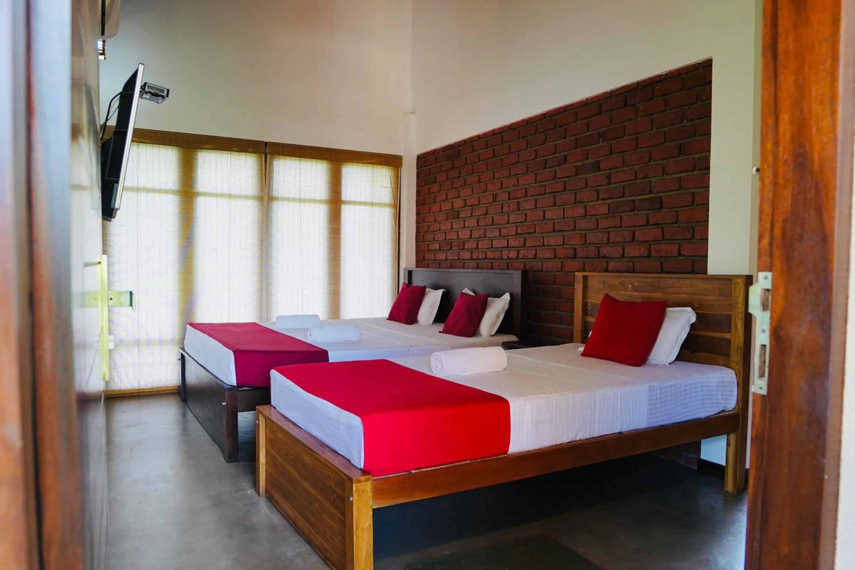 Bed in Lolu Village Resort