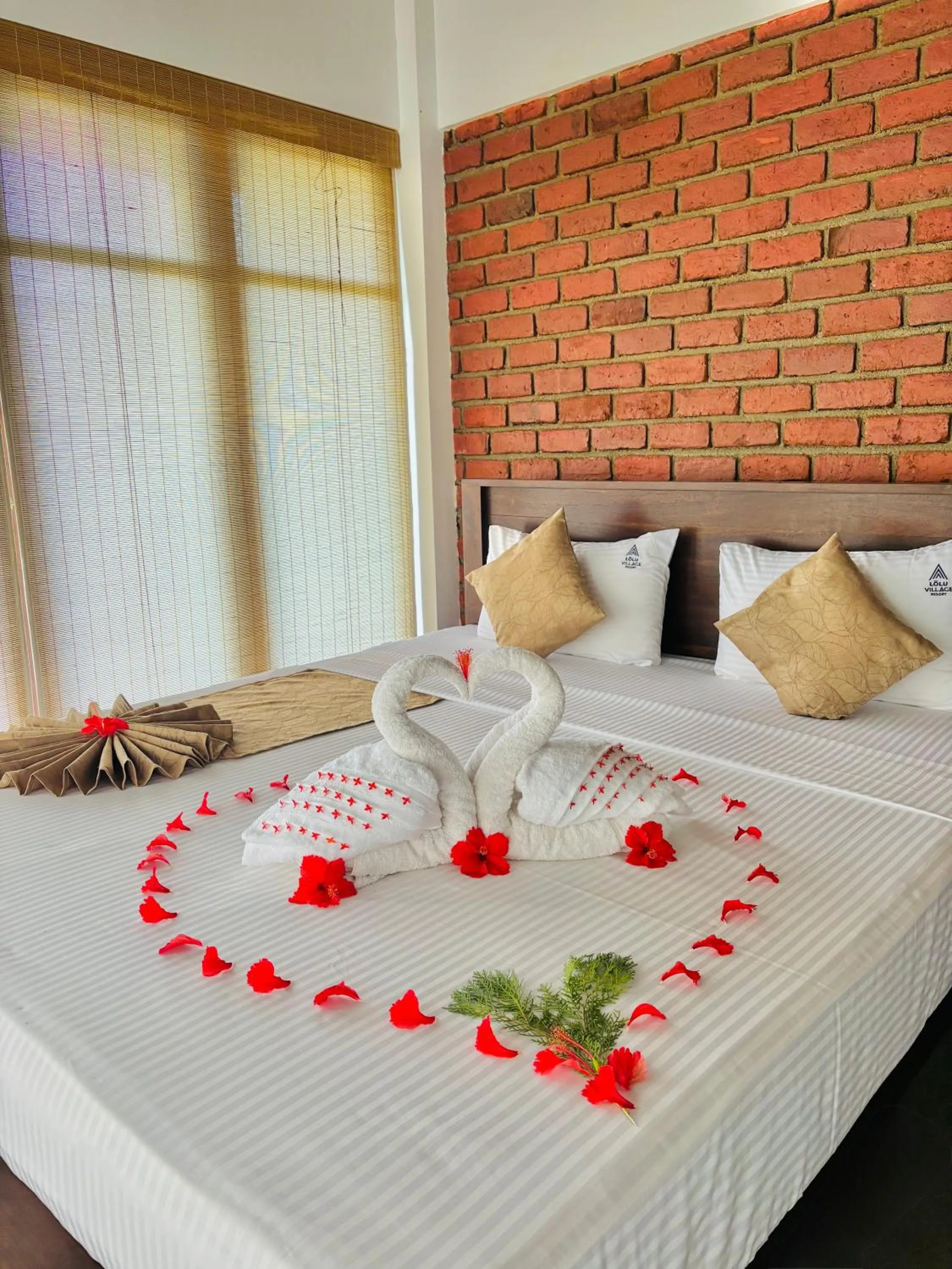 Bed in Lolu Village Resort