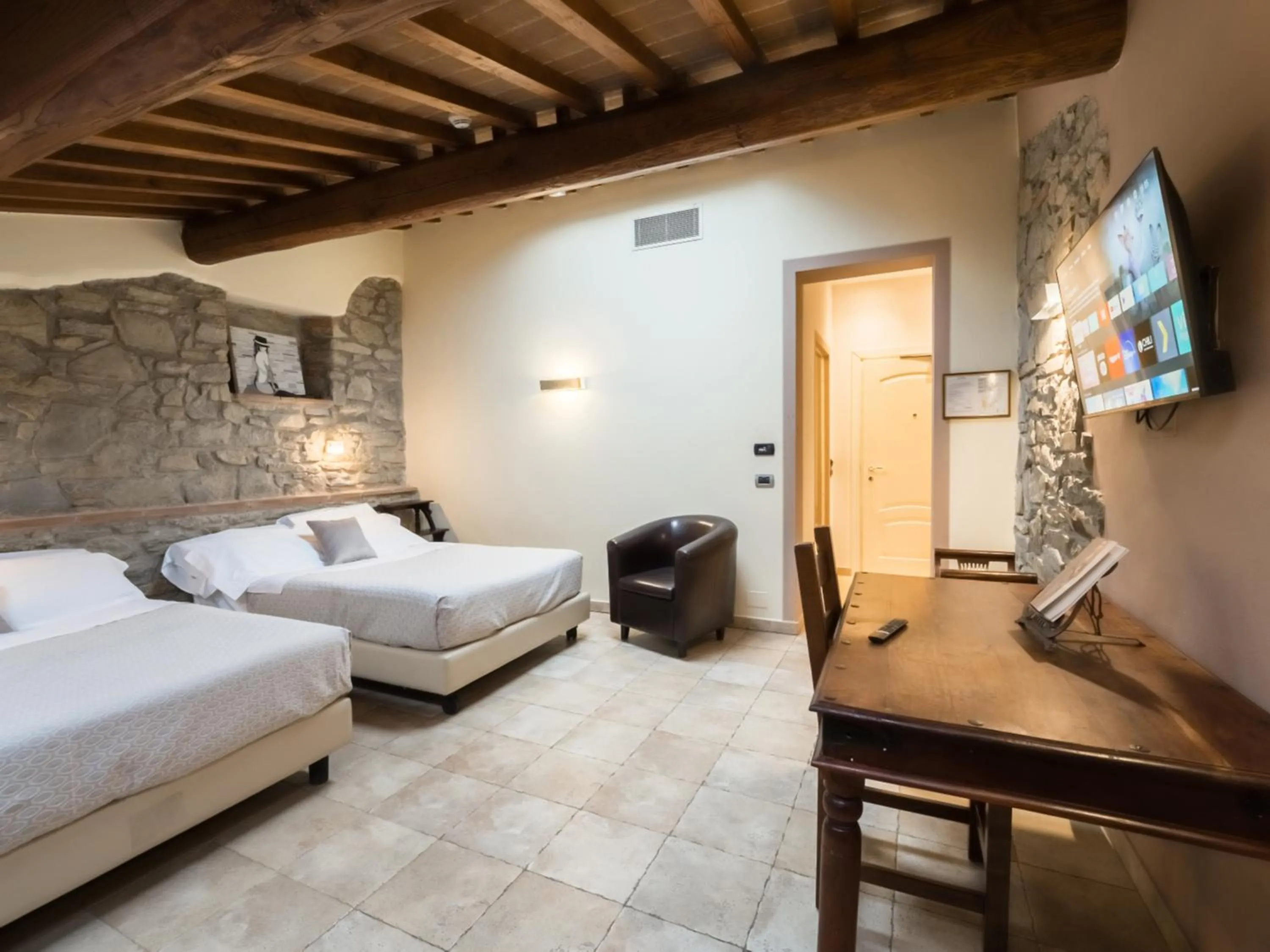 Bed in Vogue Hotel Arezzo