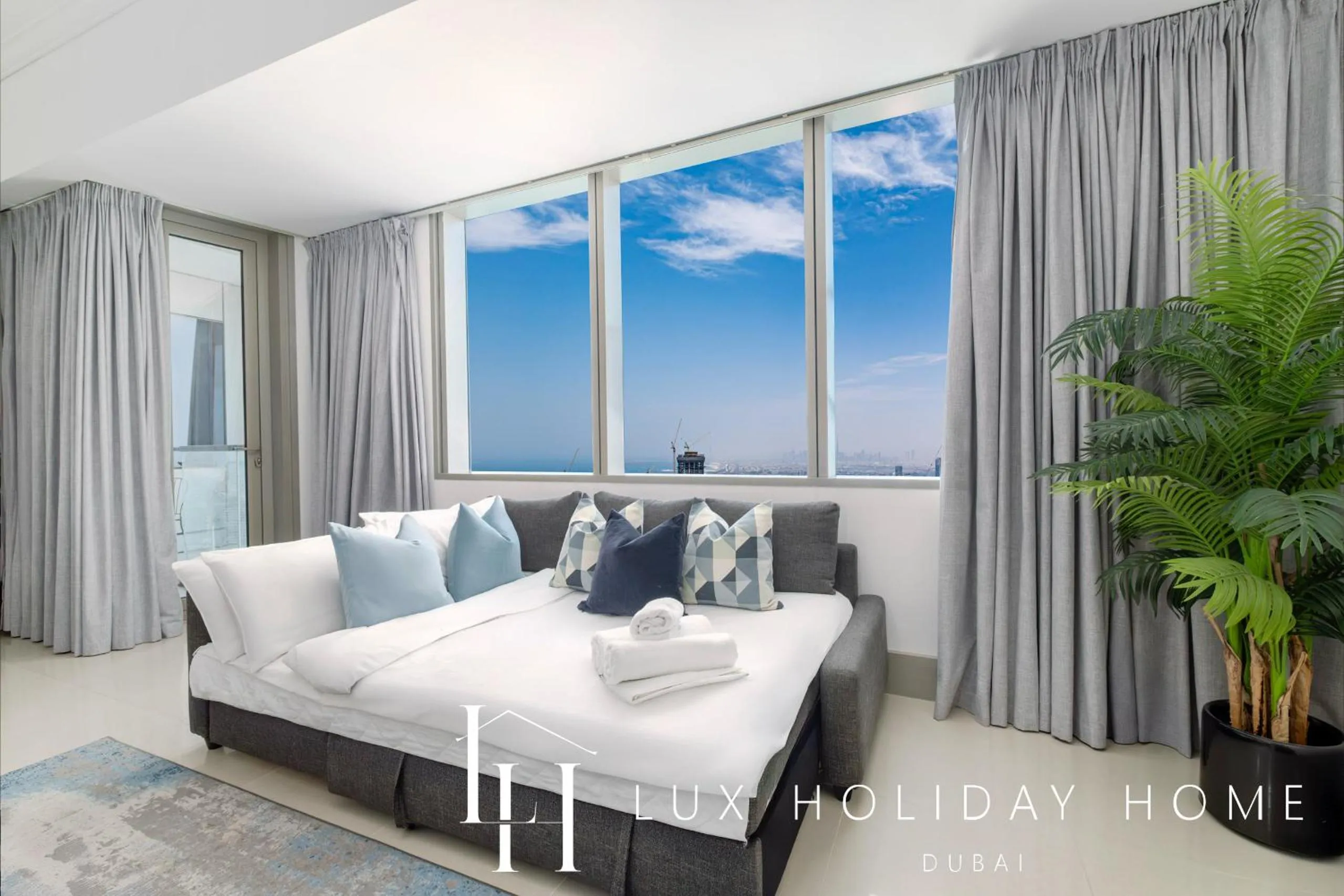 Bed in LUX The Sky View Suite Dubai Marina