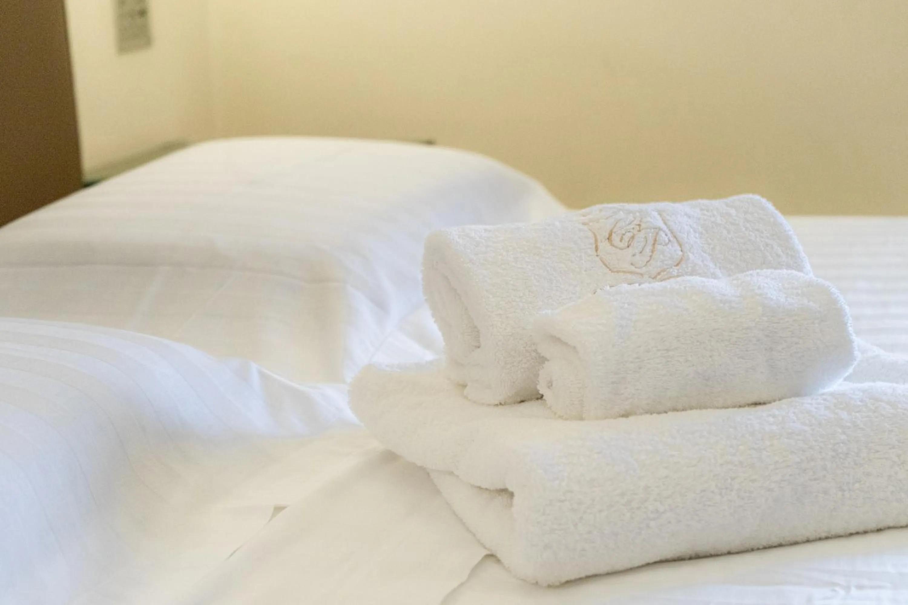 towels, Bed in Hotel Cala Del Porto