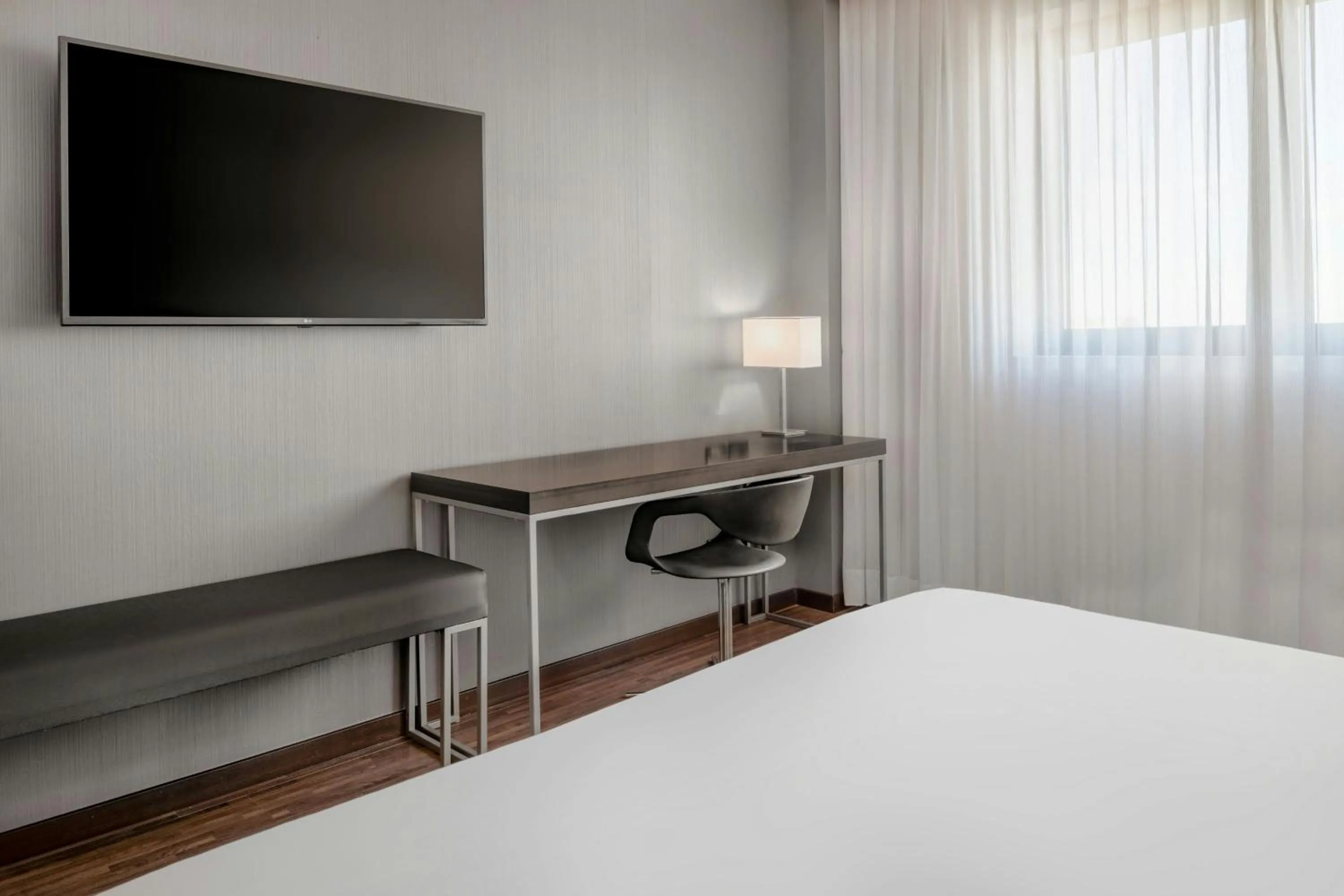 Photo of the whole room, Bed in AC Hotel by Marriott Pisa