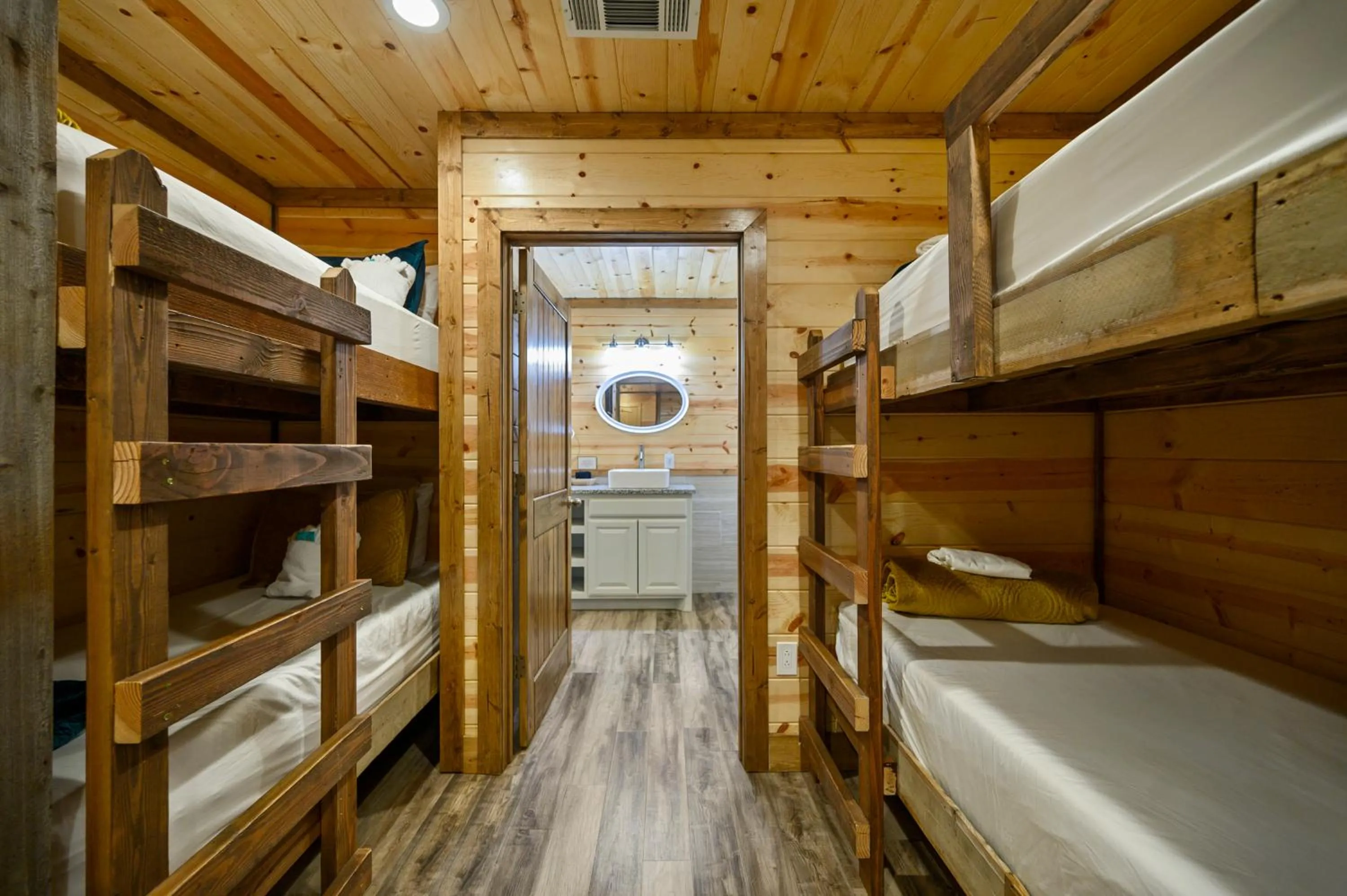 Bed in The Nomi Lodge - Sleeps 28 - Gorgeous Rustic Cabin, Centrally Located, Tons of Amenities