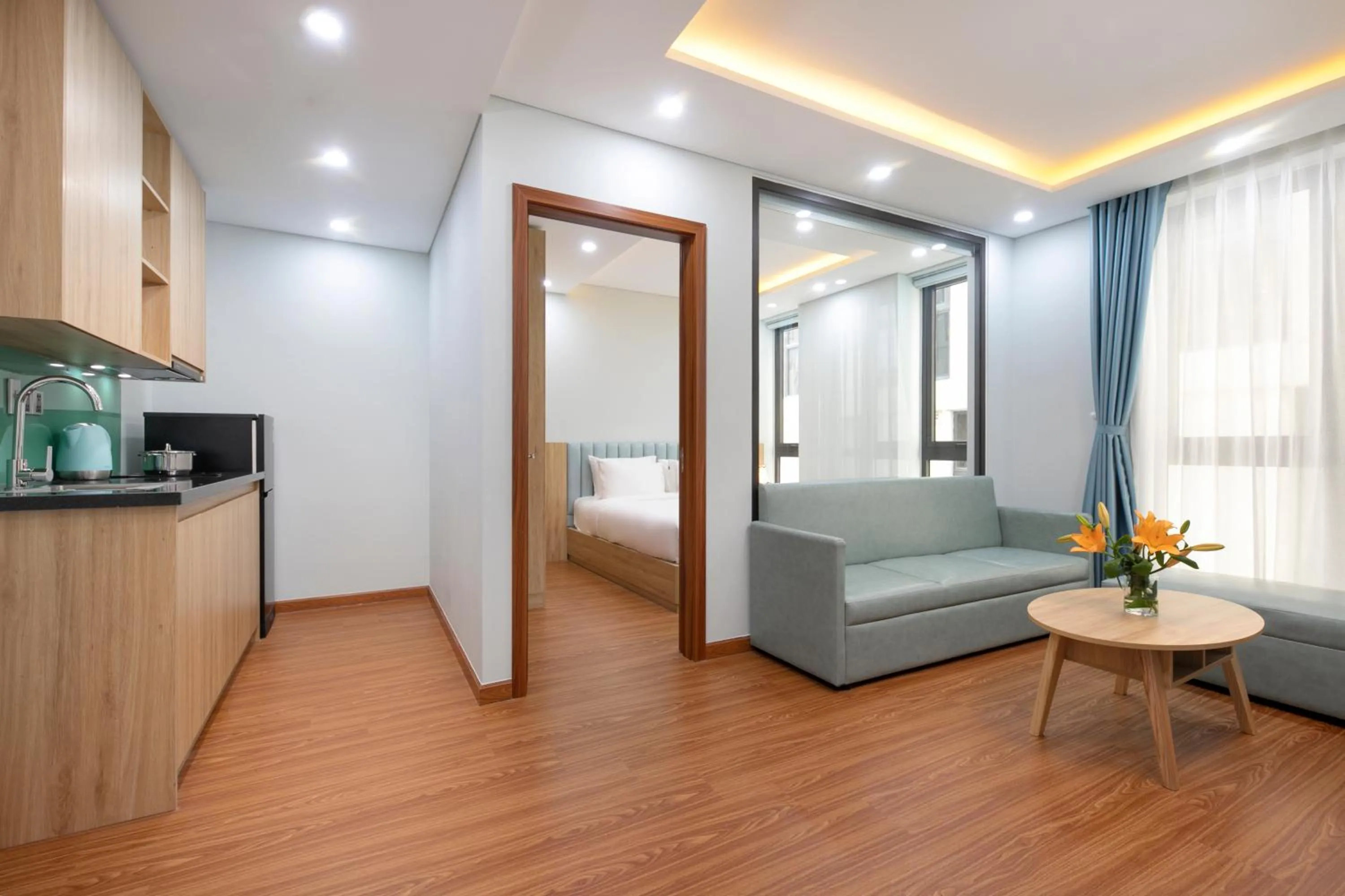 Kitchen or kitchenette, Bed in Hummer Hotel & Apartment Da Nang Beach